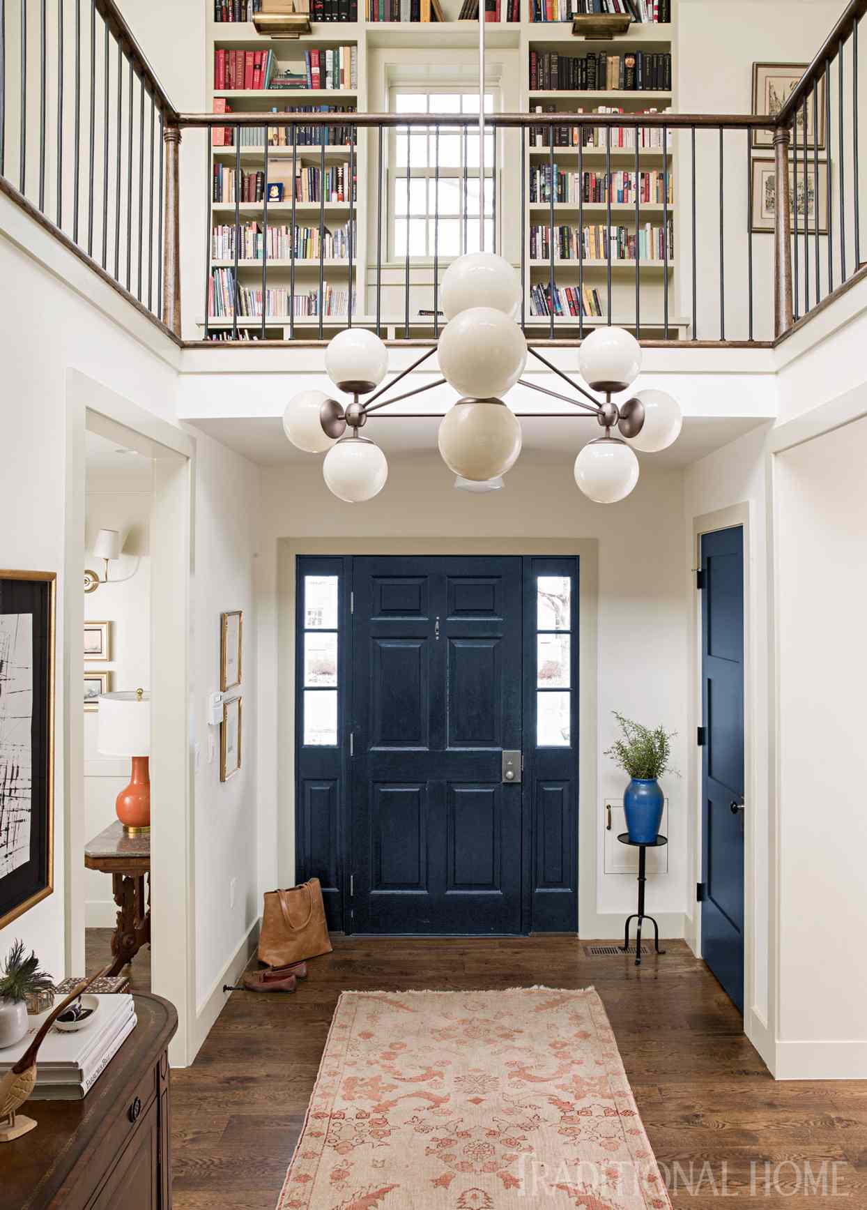 federal style home with blue door