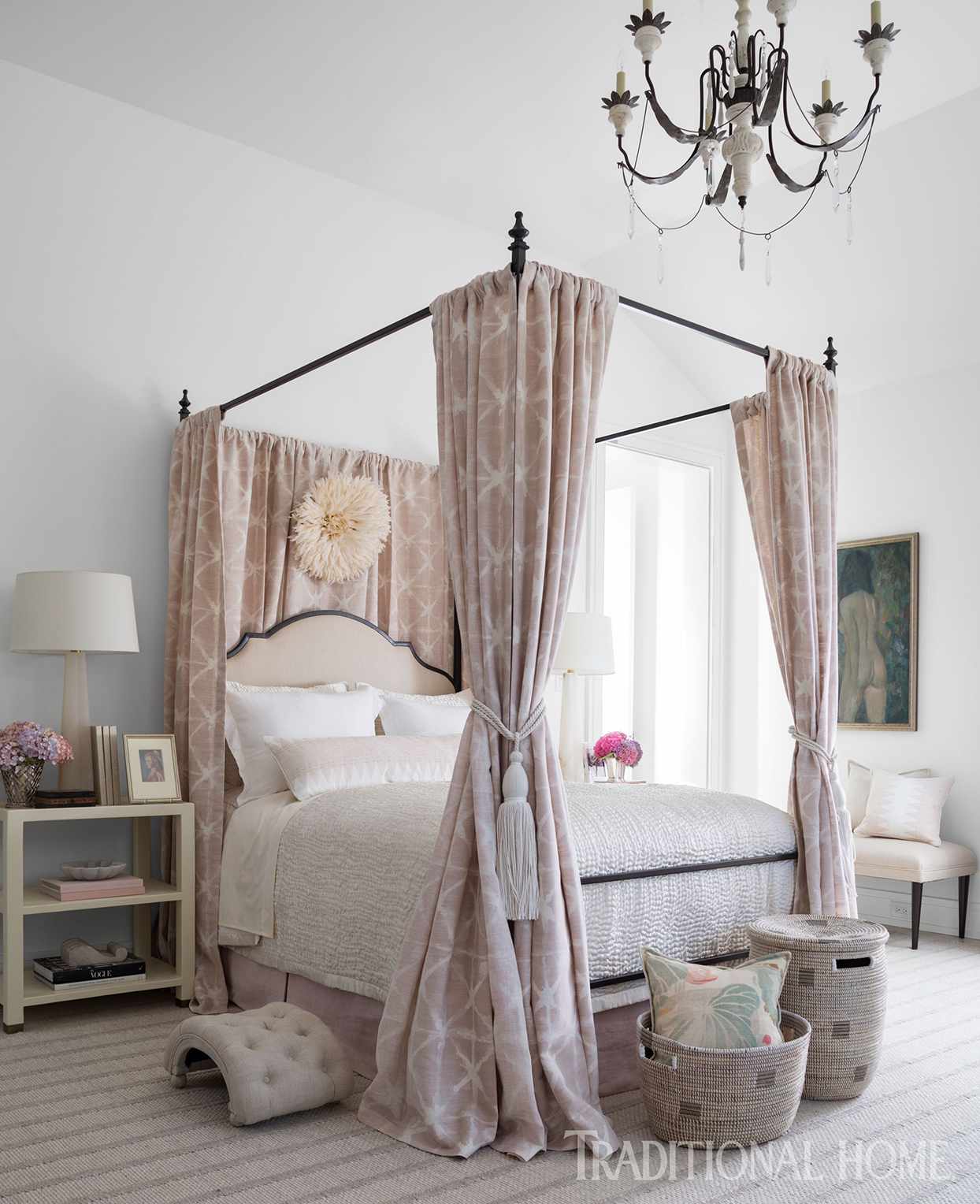 Bedroom with canopy and chandelier