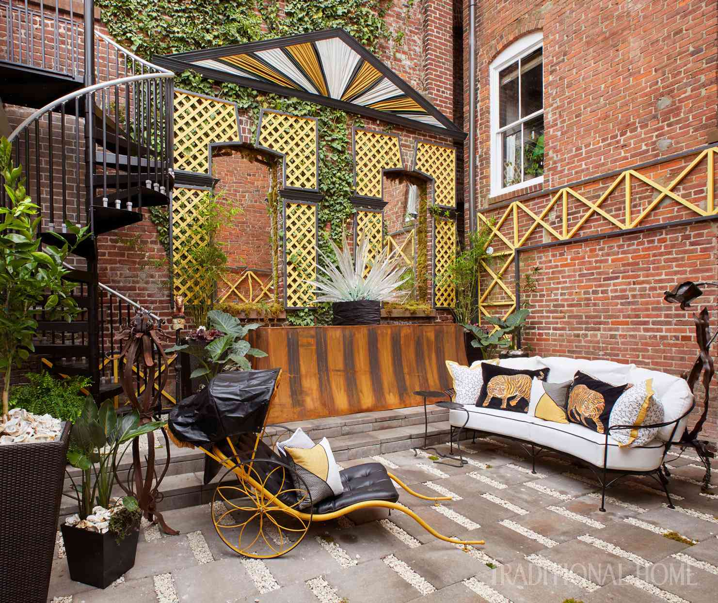 brick courtyard with couch
