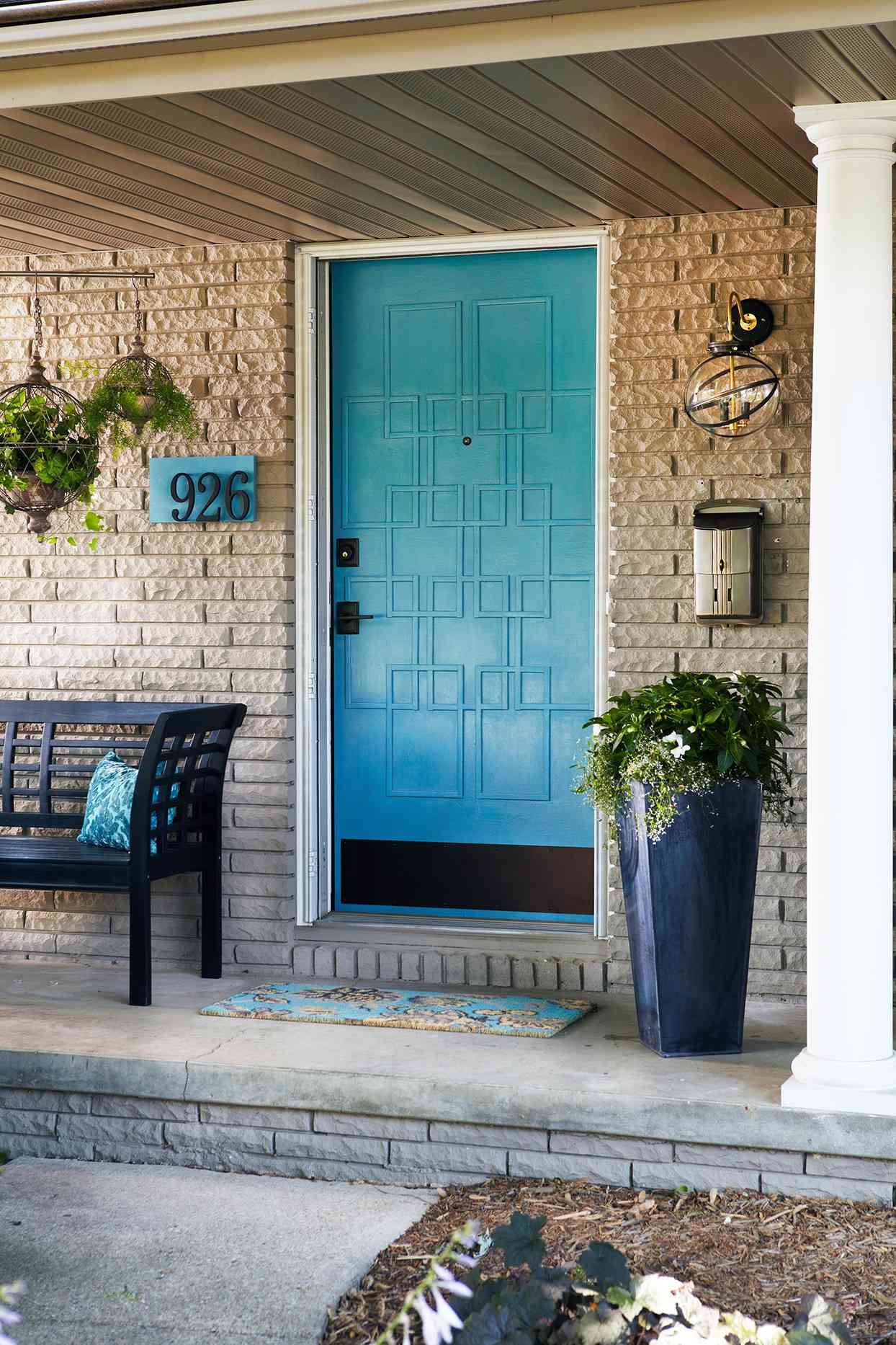 Covered porch to blue door