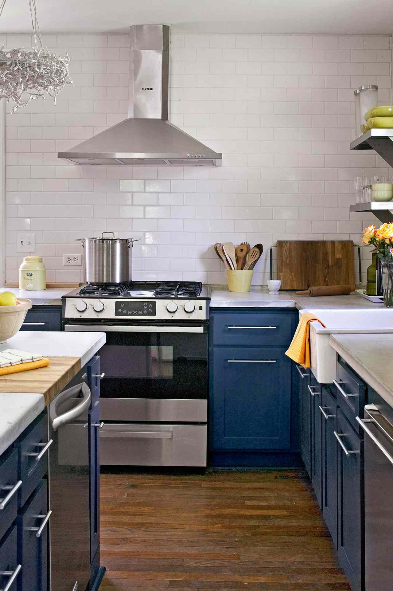 Modern style kitchen with blue cabinetry