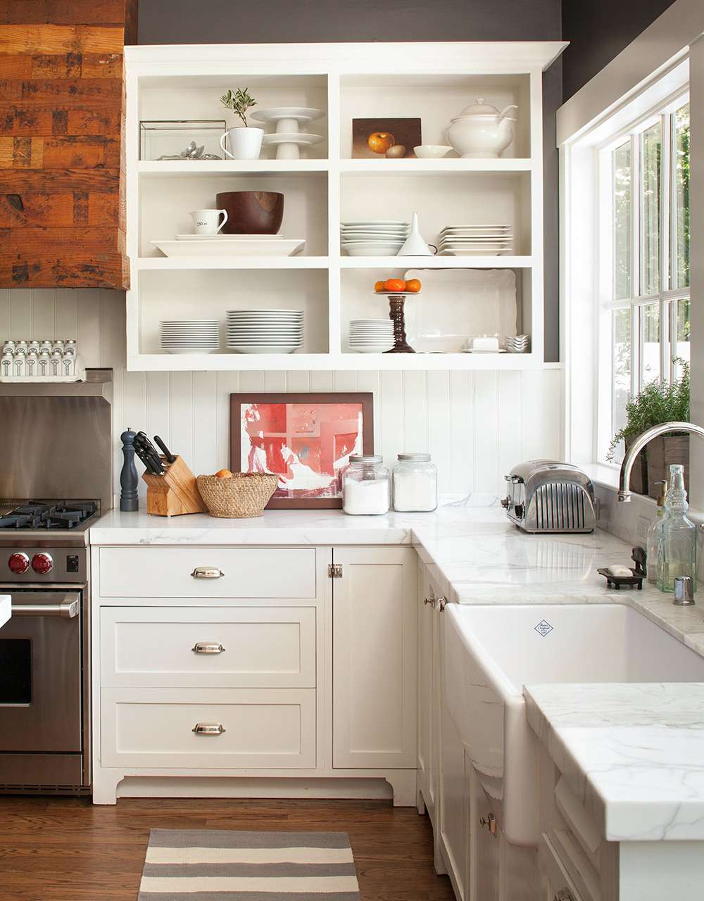 white kitchen shelving marble counter tops
