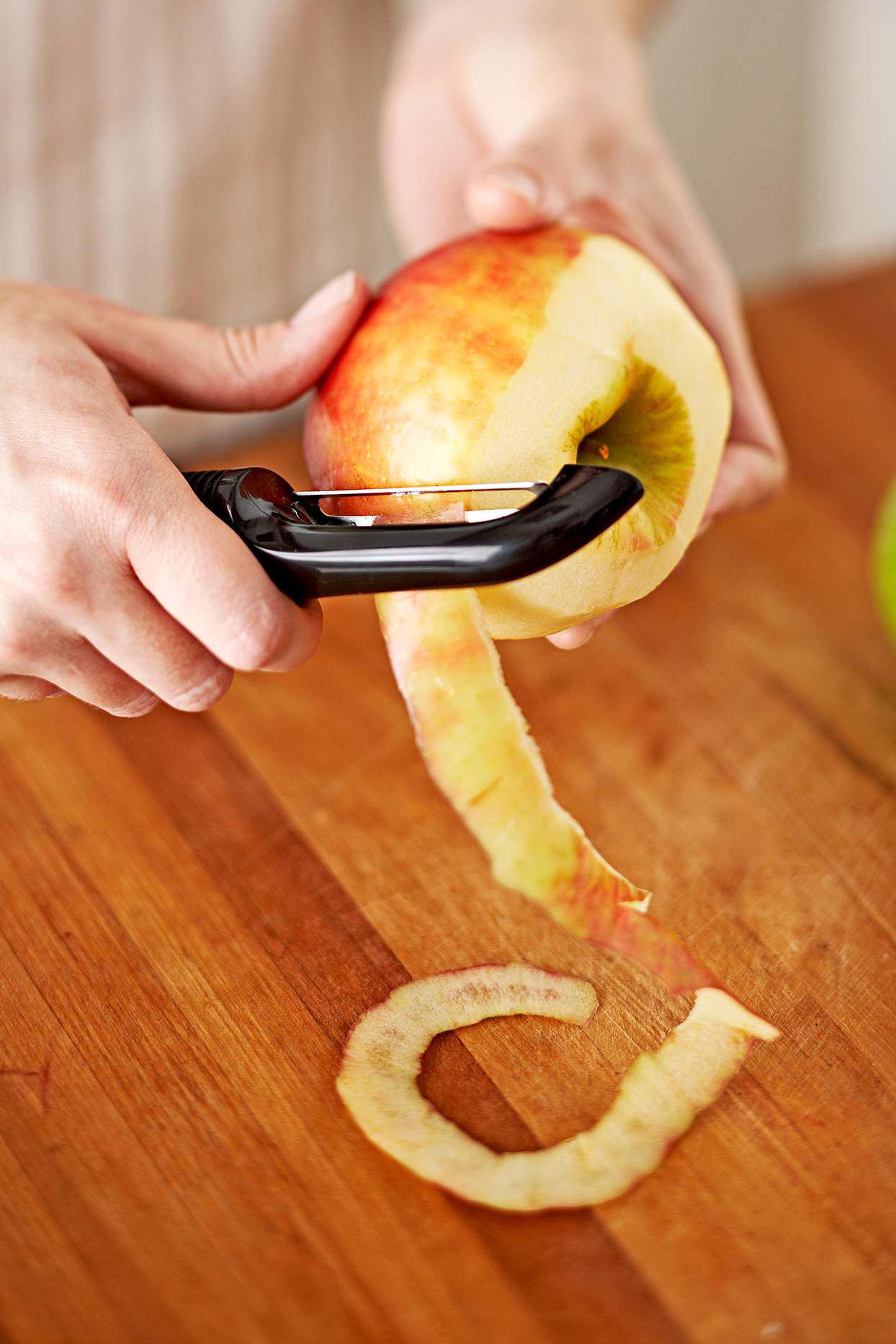 Peeling an apple skin
