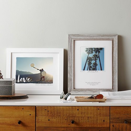 framed photos on a dresser