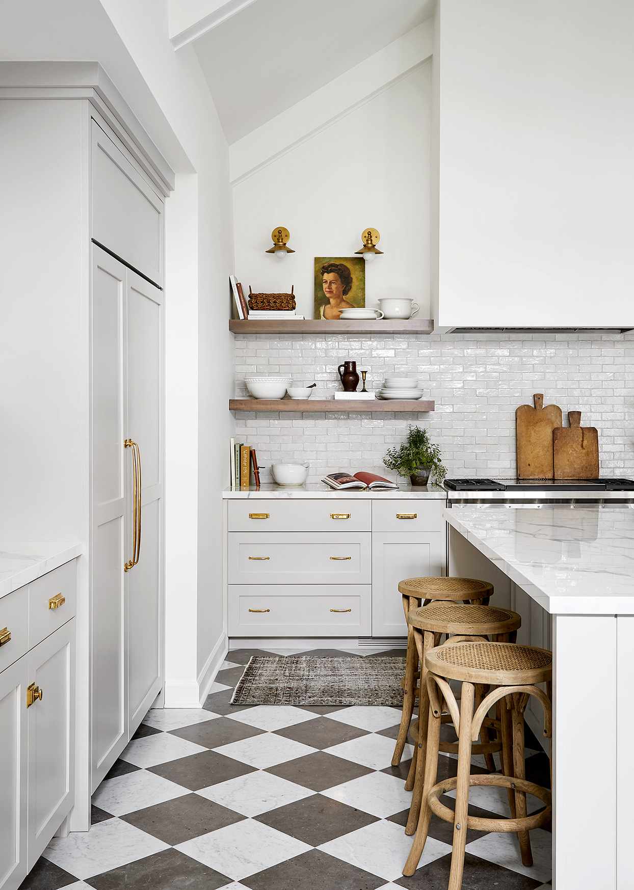 grey and white tile kitchen with stools