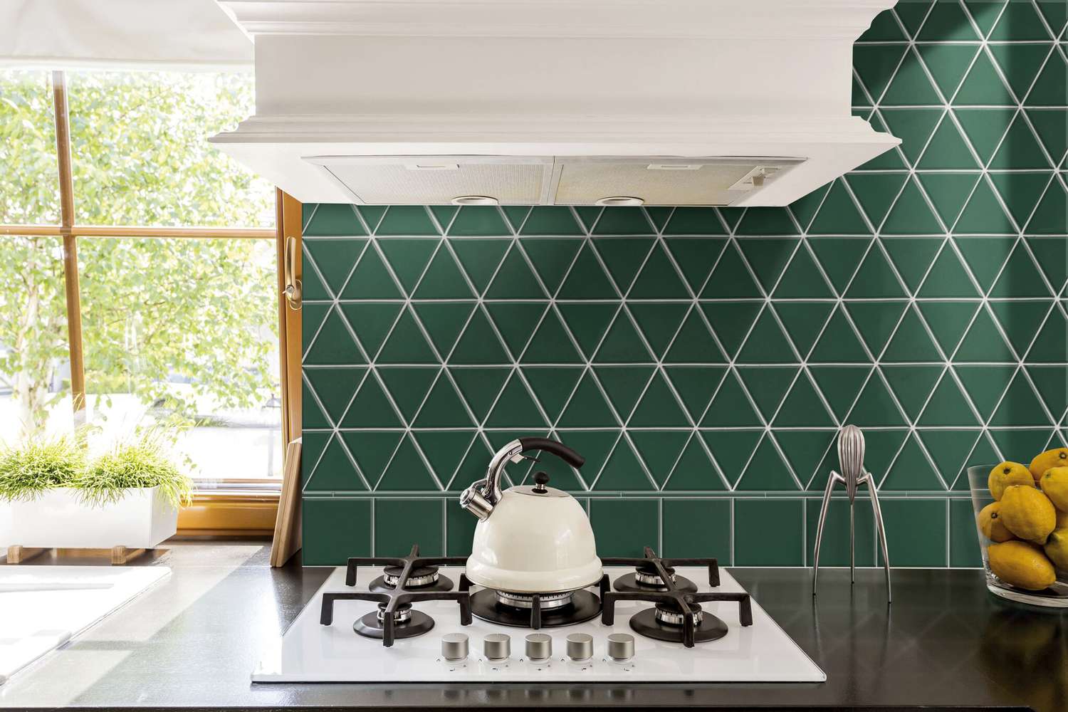 green tile behind stove top