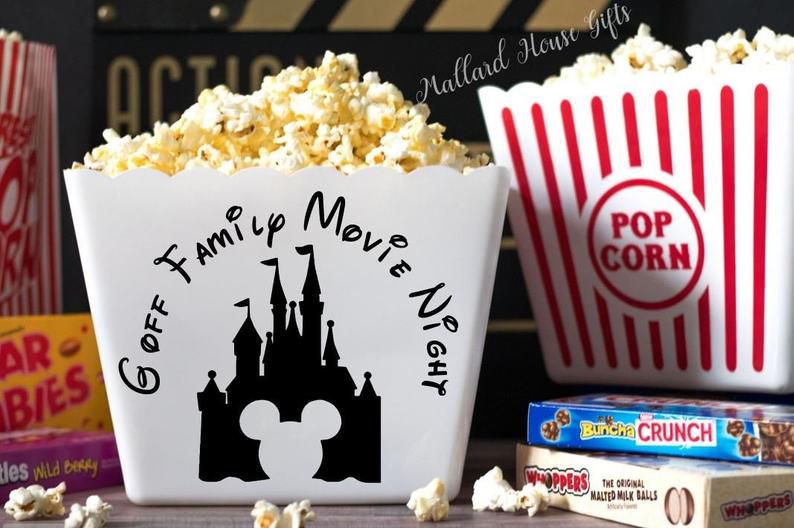 white popcorn bowl with disney logo that says groff family movie night