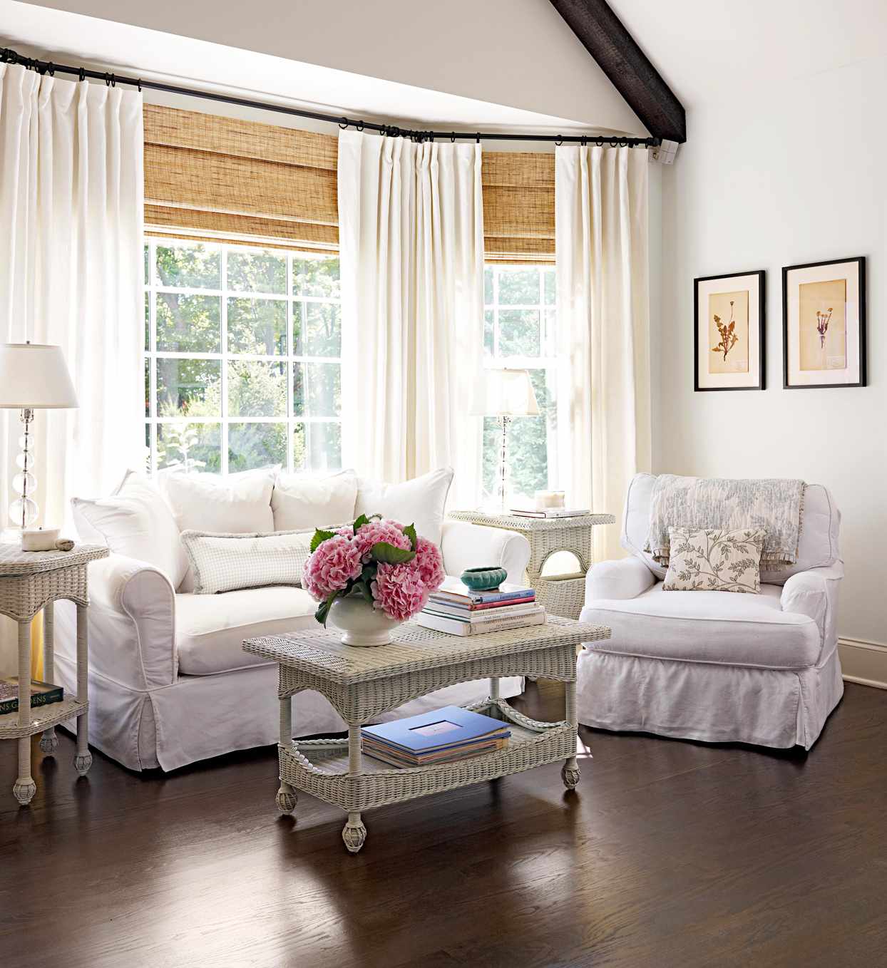 living room bay windows with white curtains