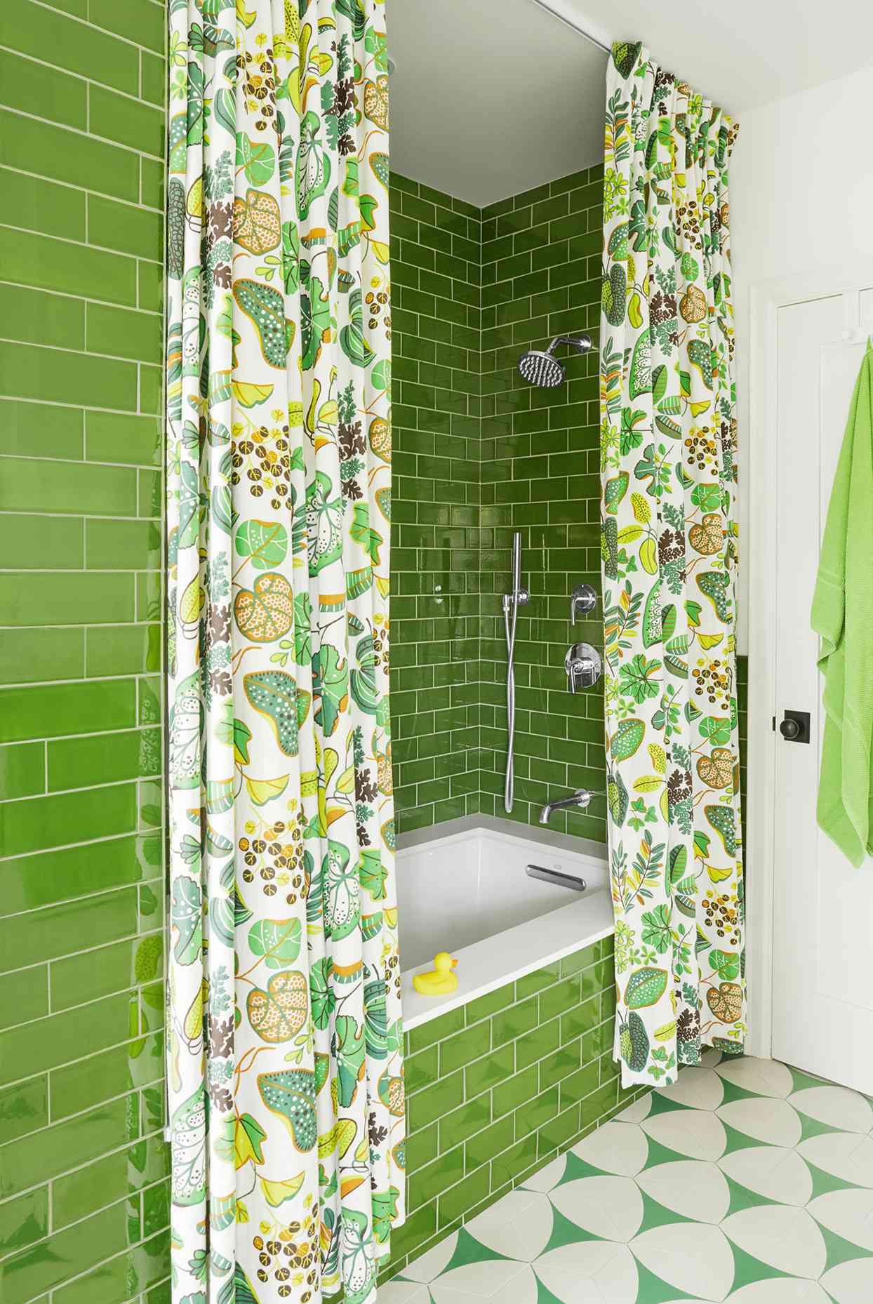 Bathroom with green subway tile