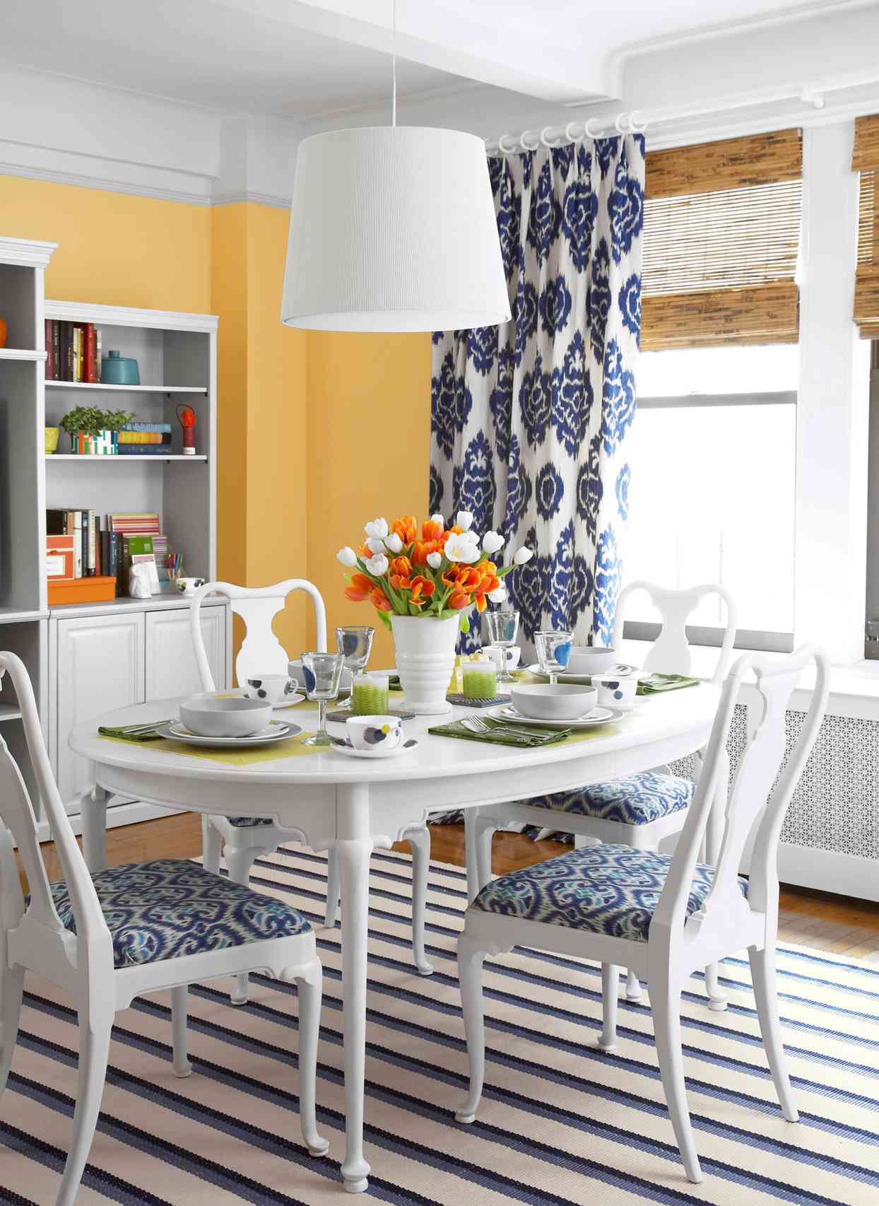 navy and yellow dining room