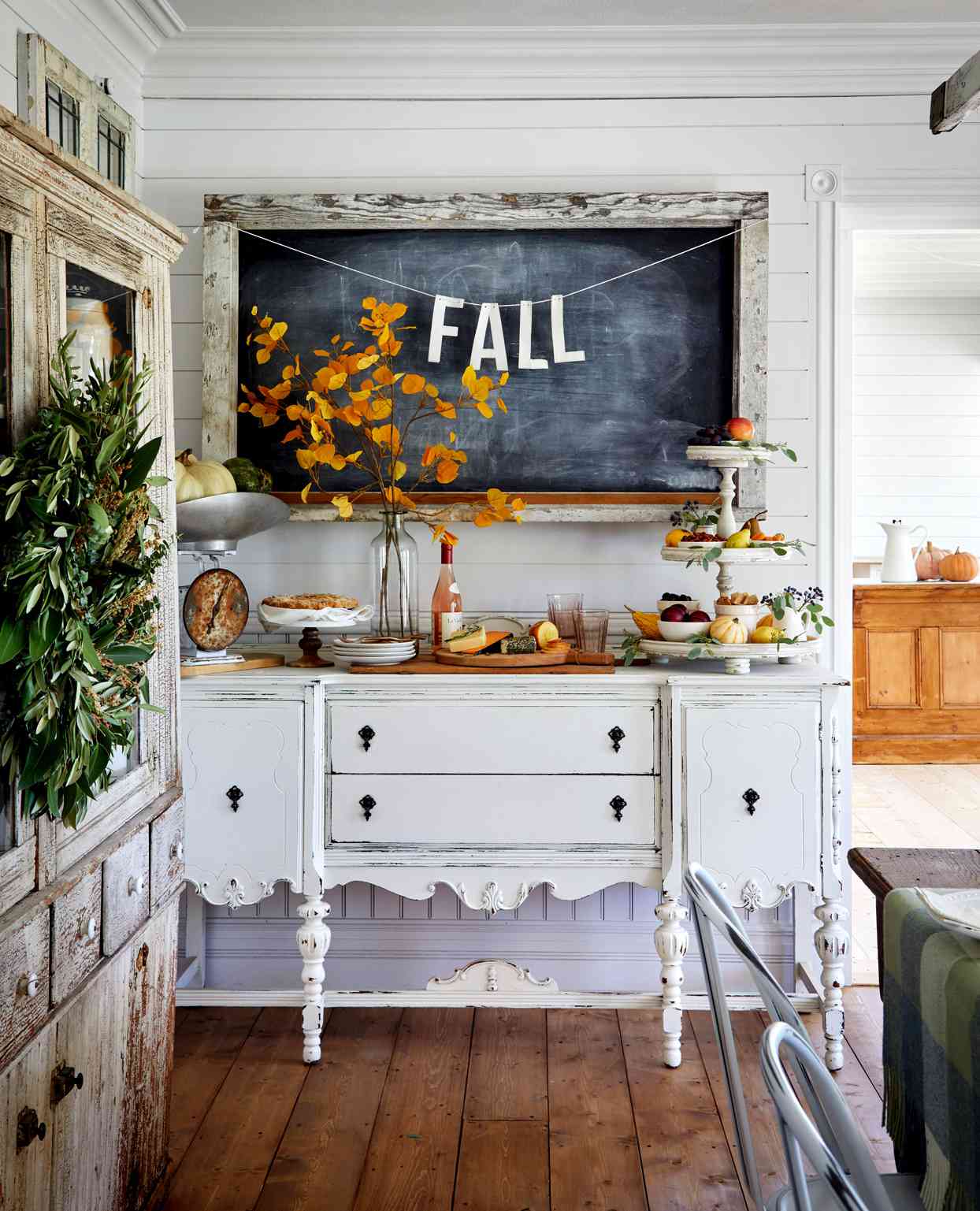 white buffet with chalkboard