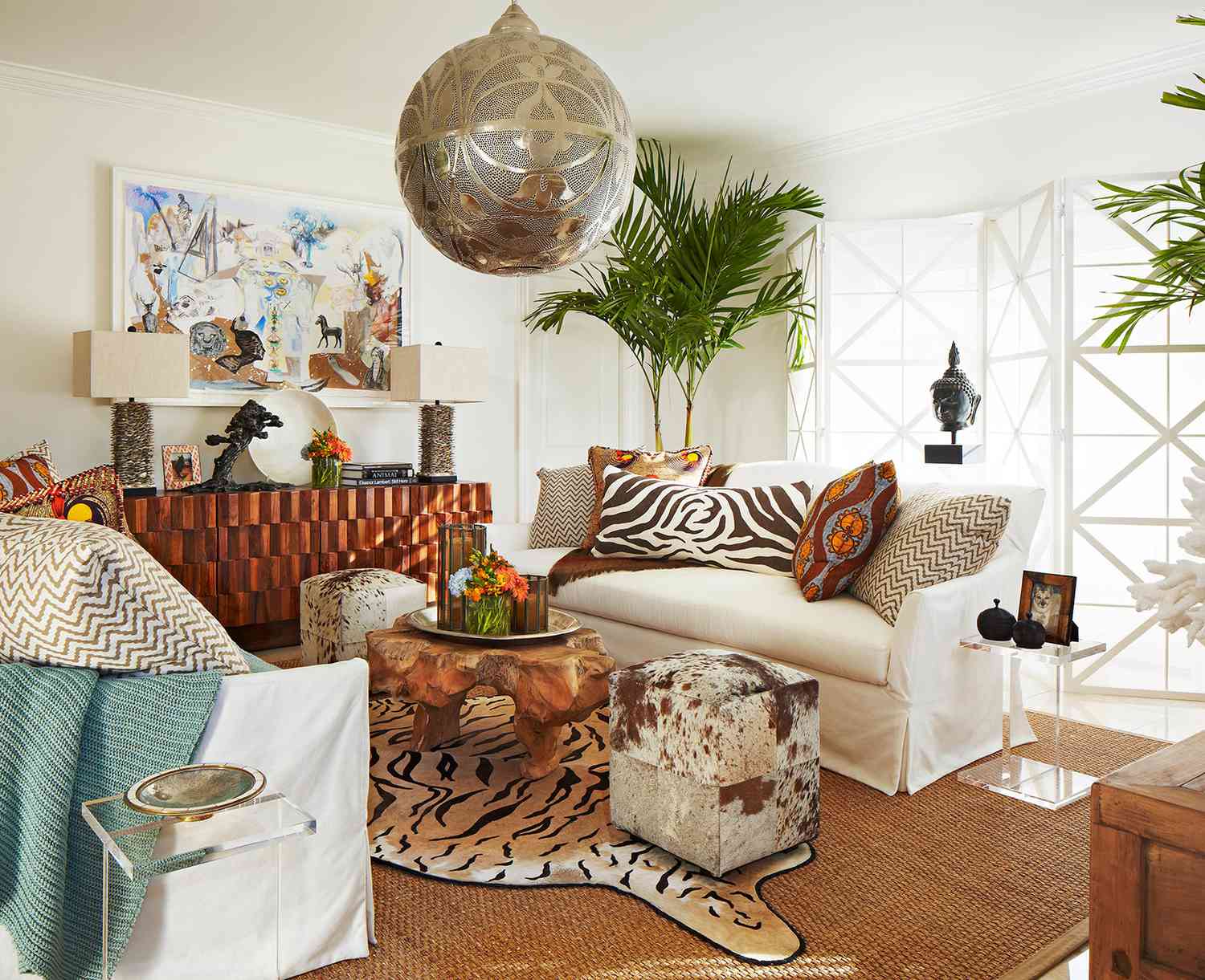 living room tiger rug cowhide ottoman zebra pillow