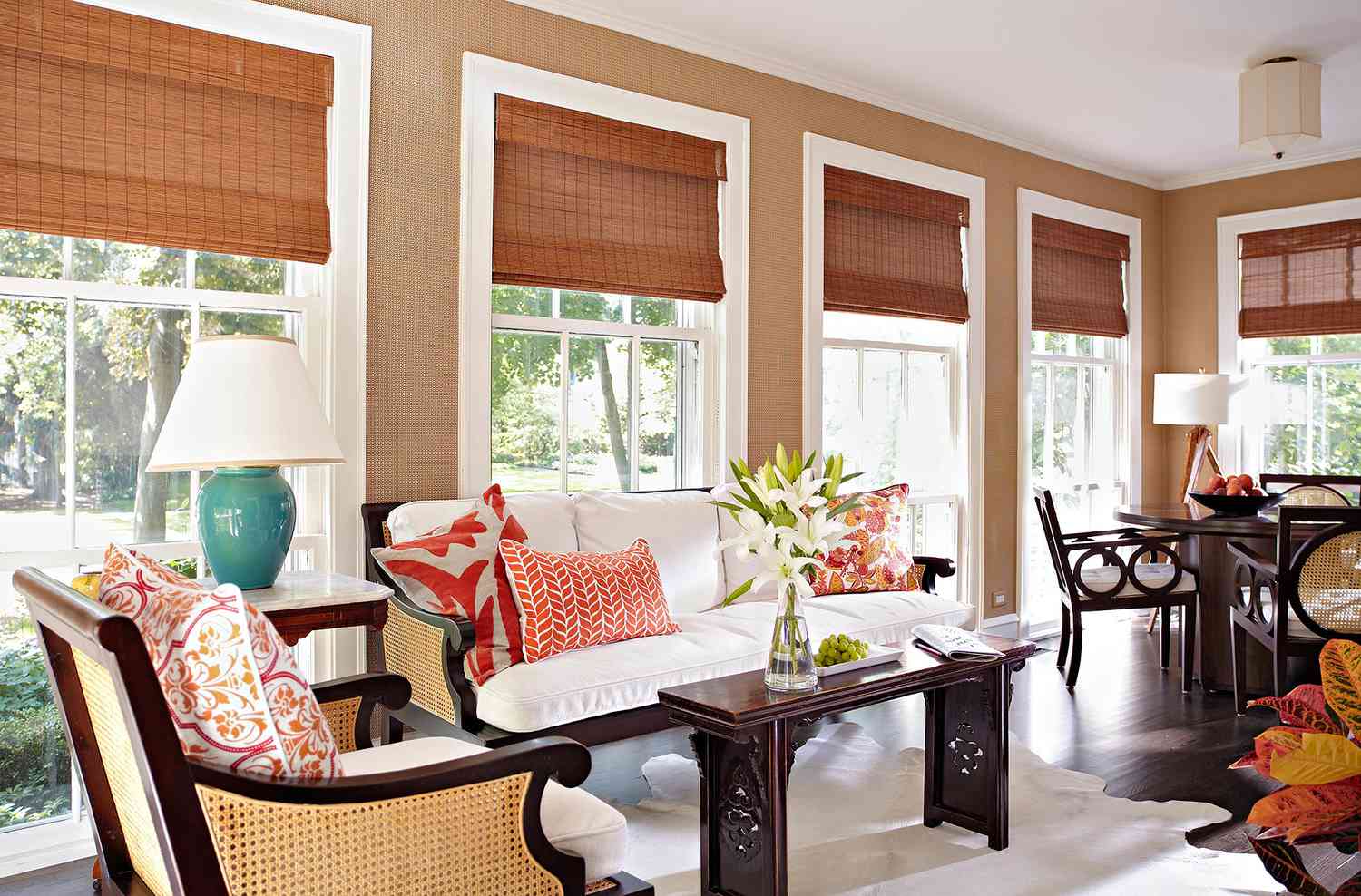 formal sunroom with designated living and dining zones