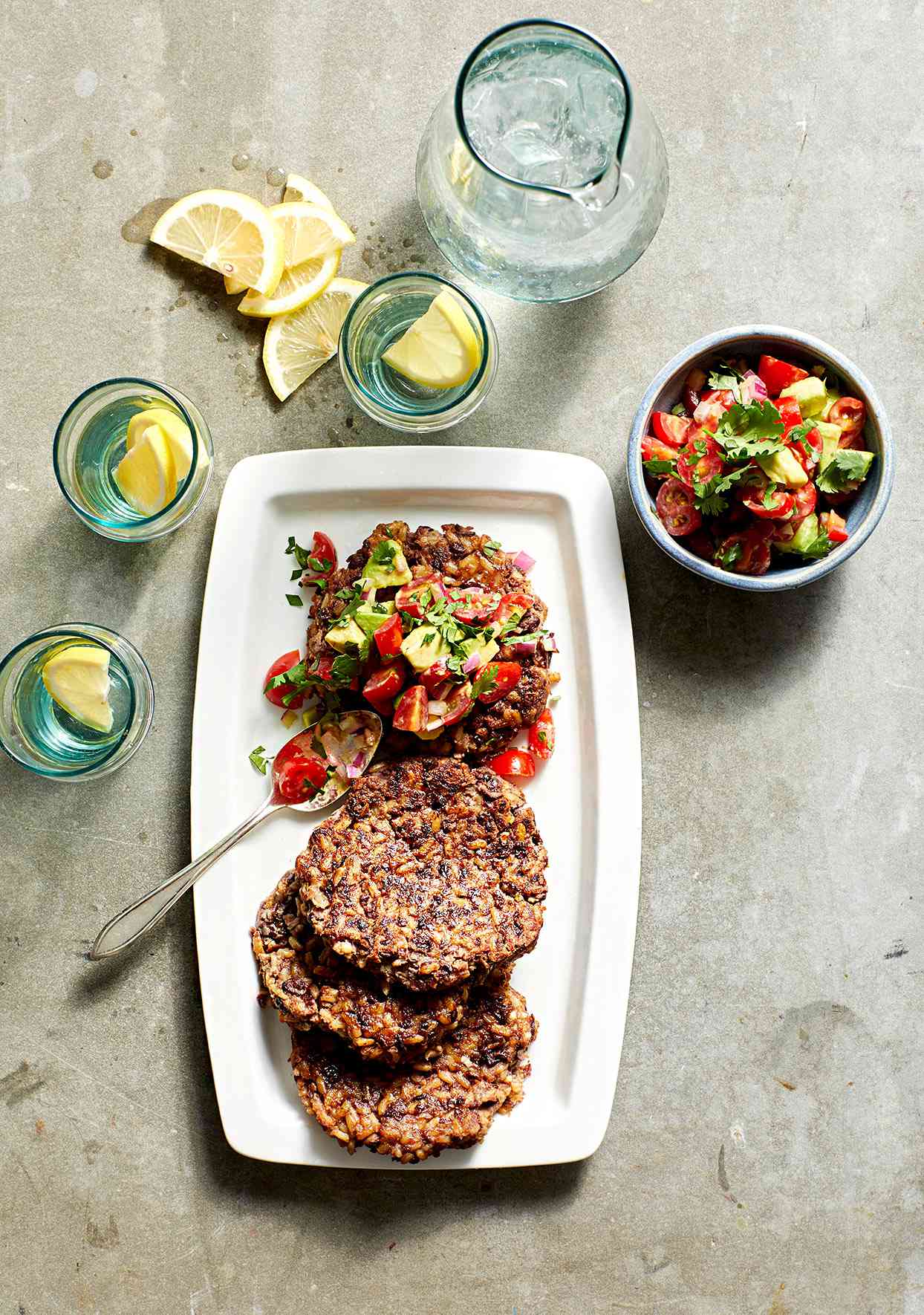 plate of Black Bean and Rice Patties with Fresh Tomato-Avocado Salsa