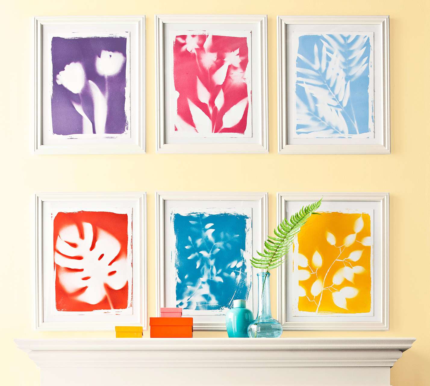 colorful botanical prints above mantel