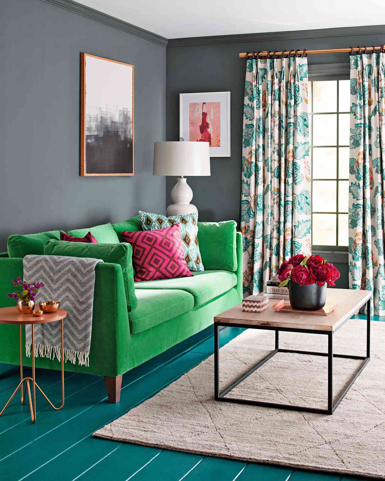 green couch living room gray walls