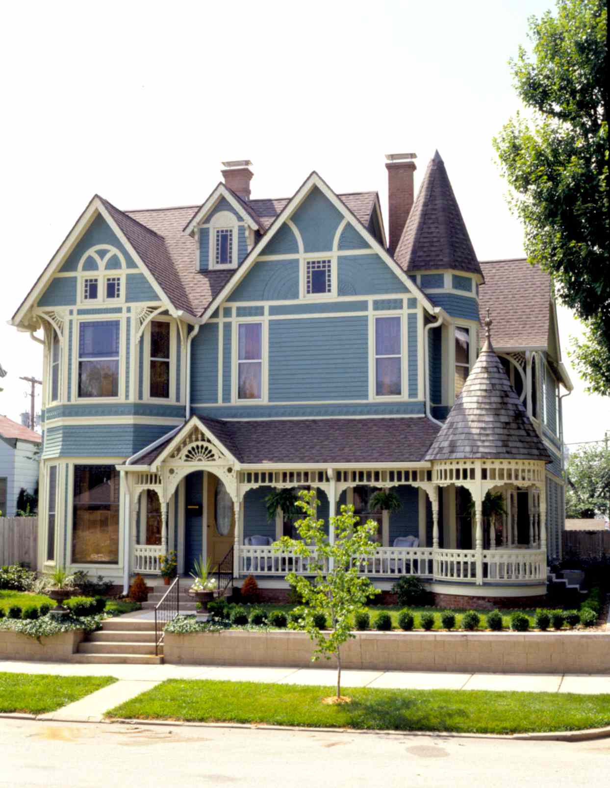 Exterior of blue and white Victorian style house
