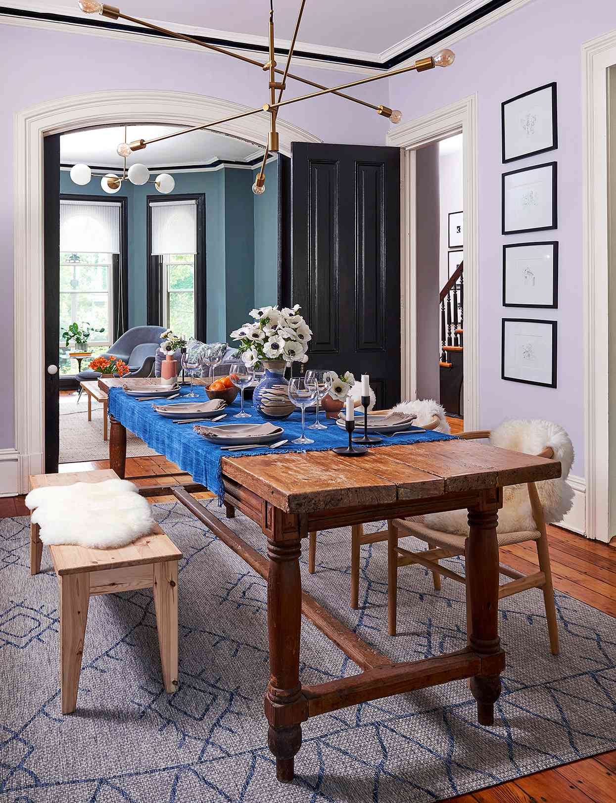 rustic dining table in room with lavender-gray walls