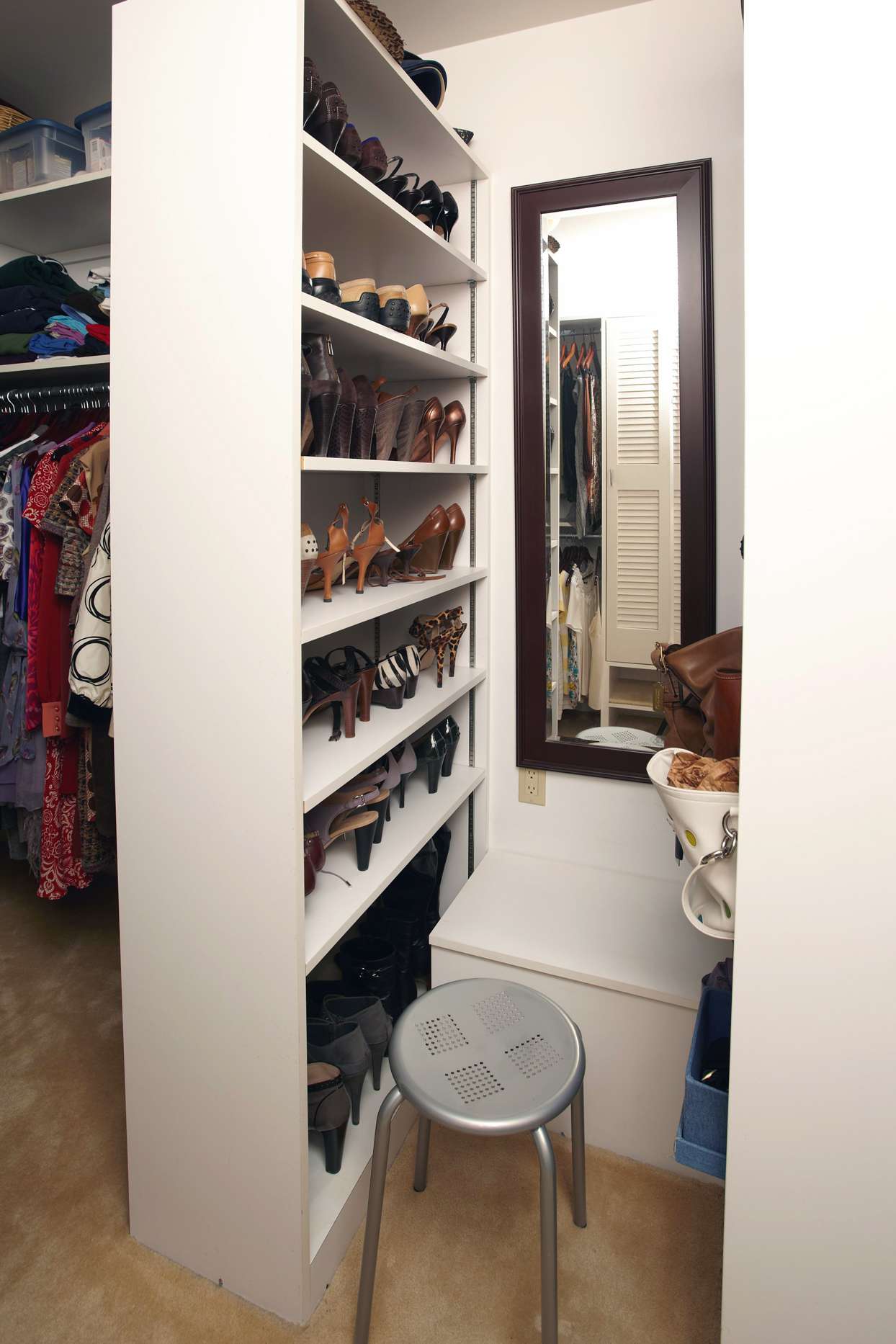 walk in closet with shoe shelf divider