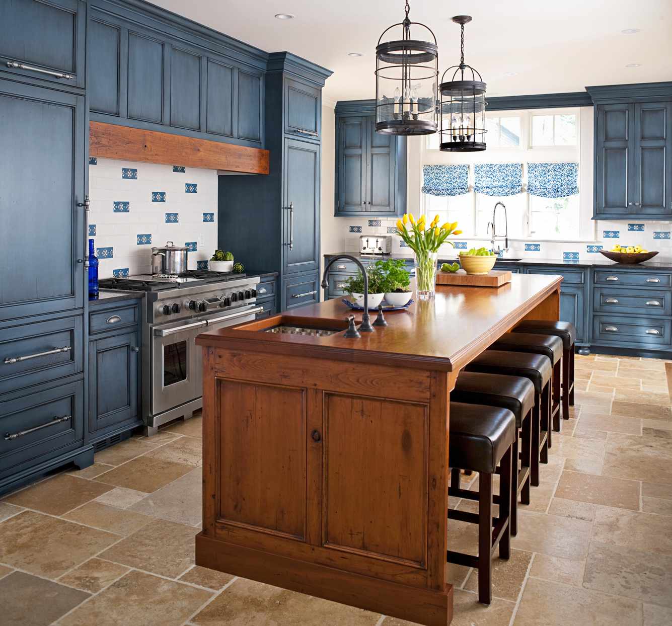 textured wood island in blue kitchen