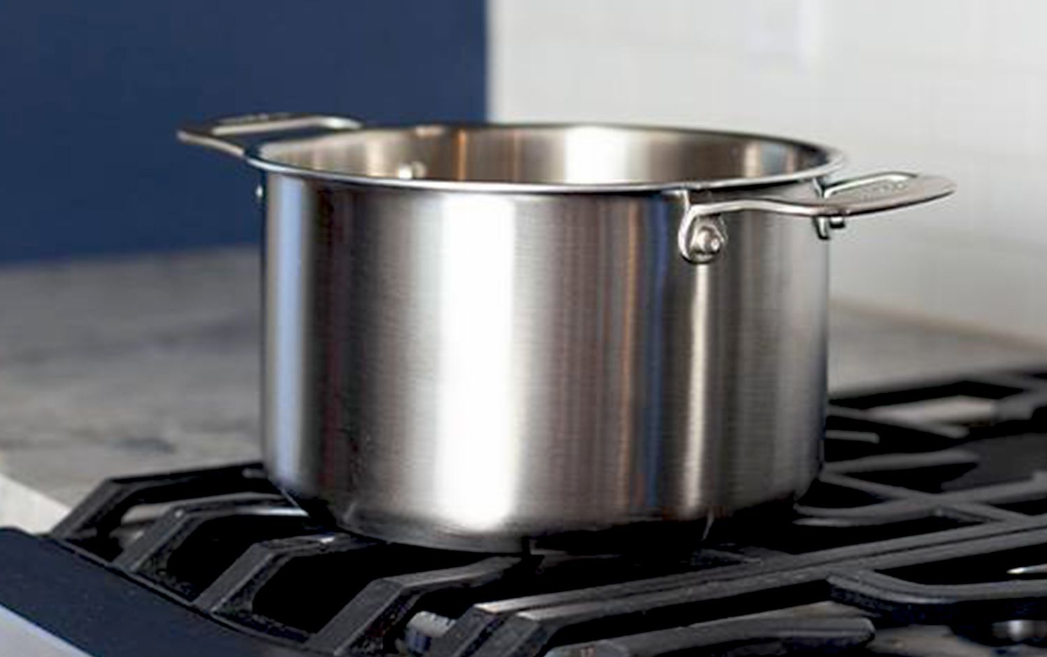 Stainless stockpot on a stove in a kitchen