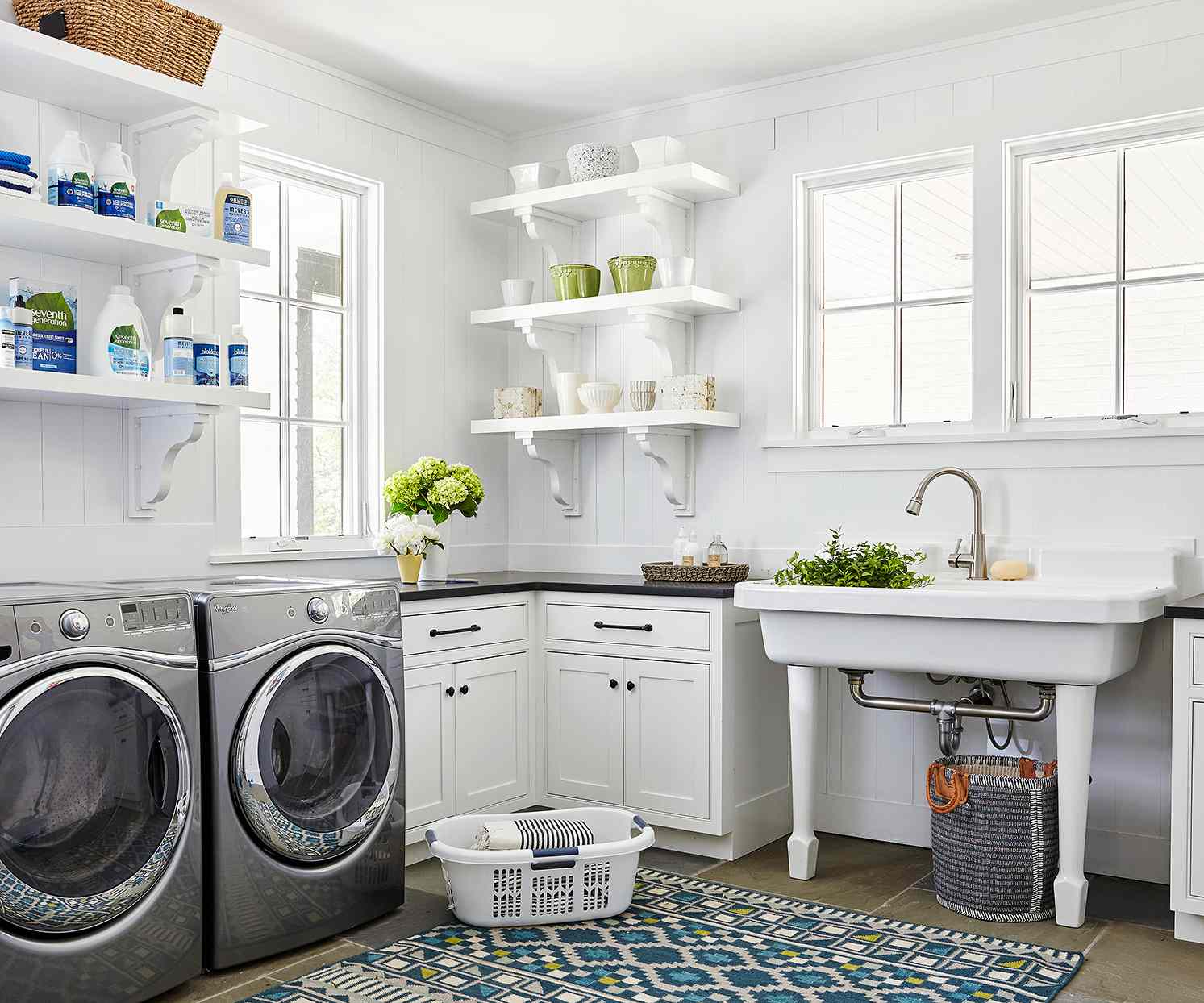 white utility room with open shelves and large sink