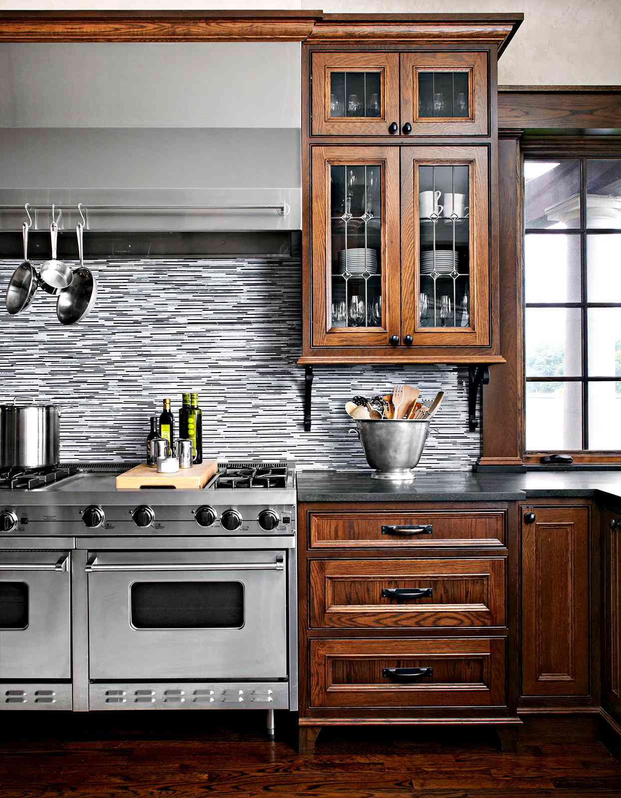Transitional style kitchen with double oven