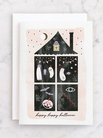pink greeting card with haunted house