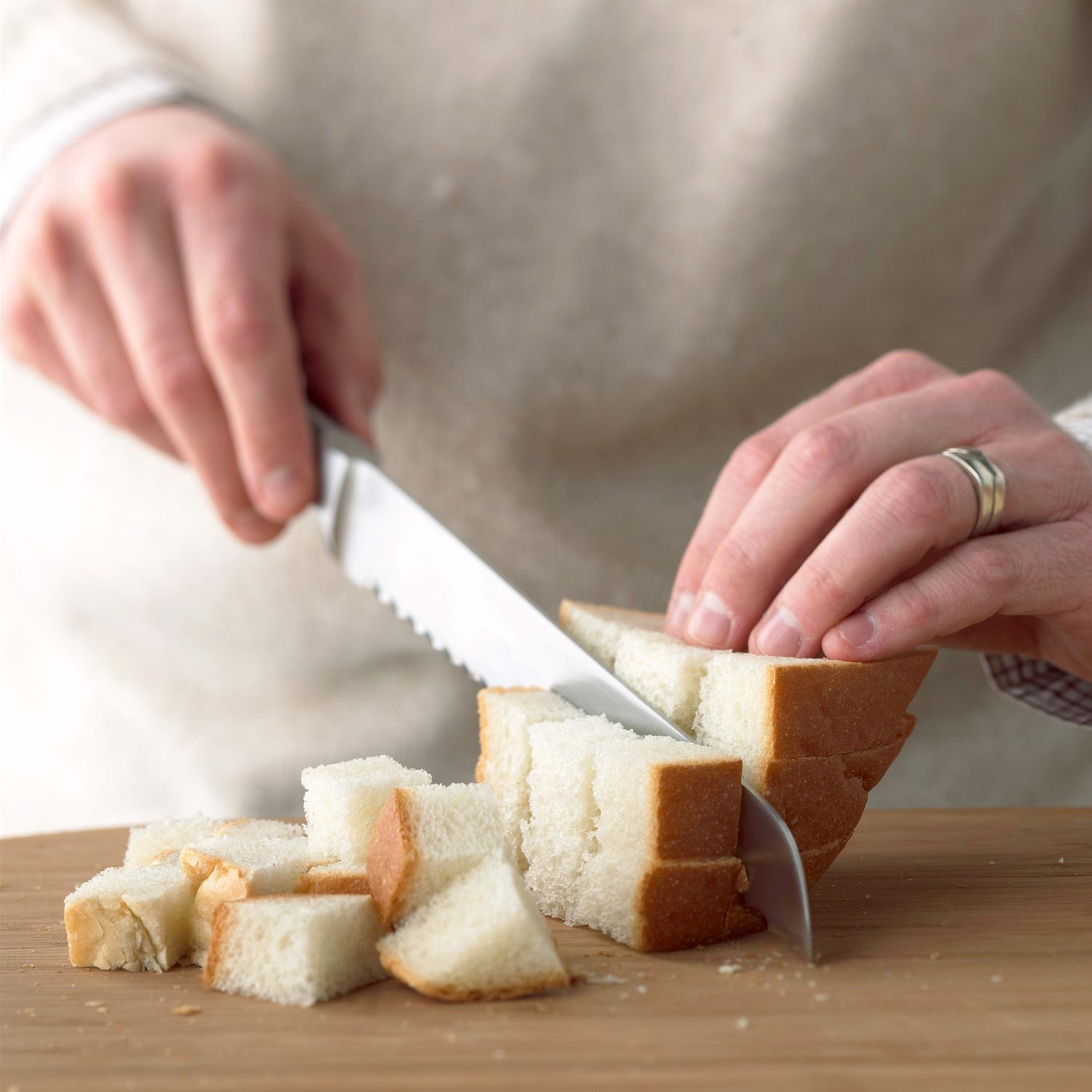 Cutting up bread cubes