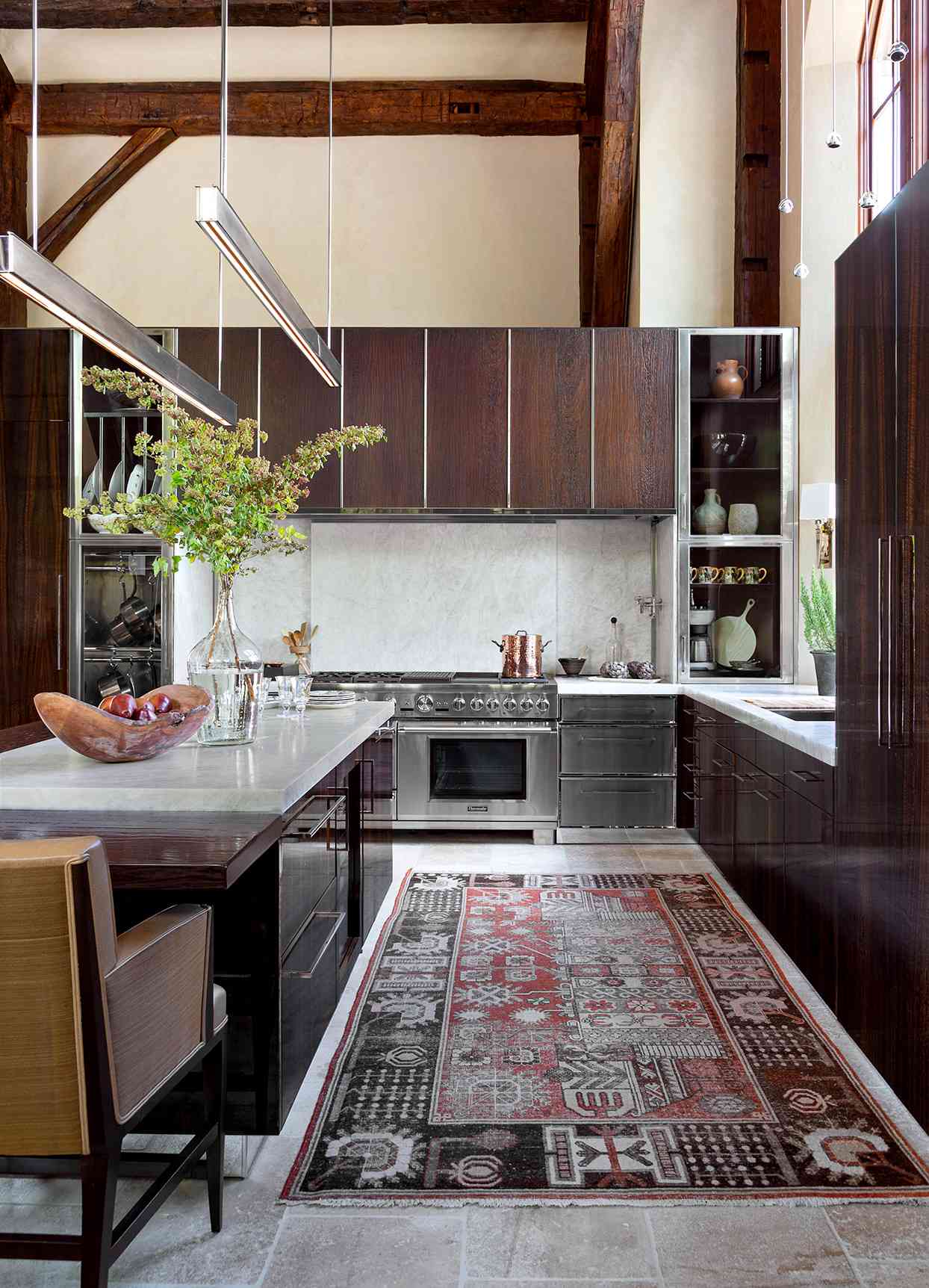 kitchen with wooden cabinets and patterned rug