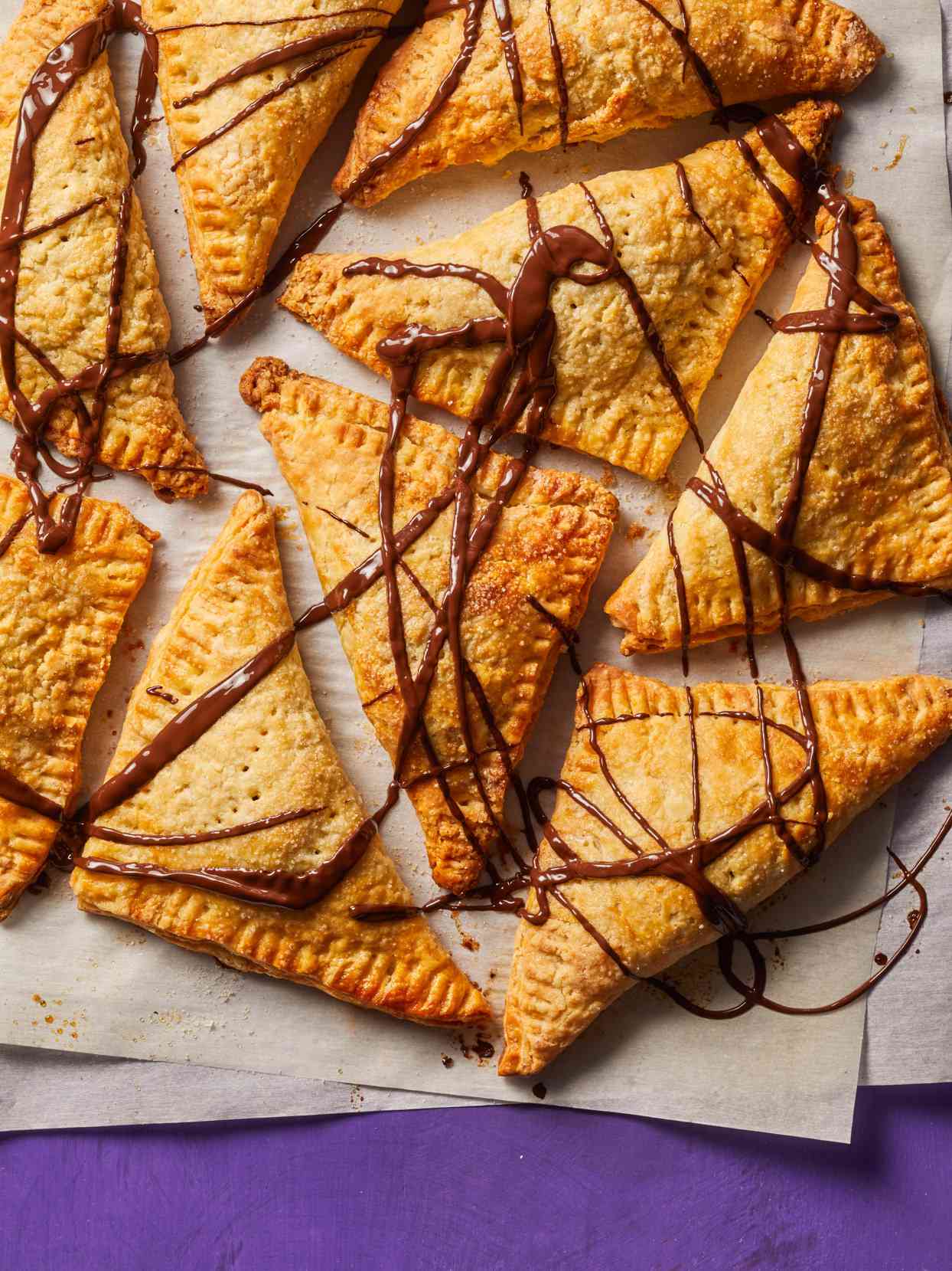 tray of Roasted Pumpkin Hand Pies with chocolate drizzle
