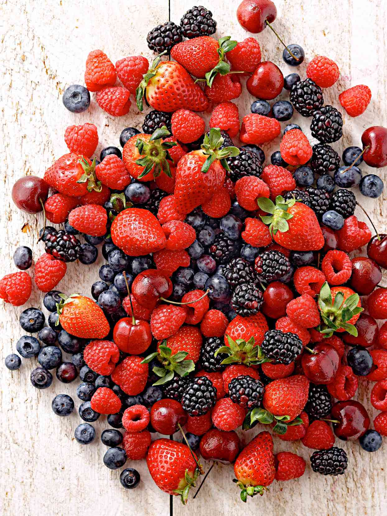 assorted berries on table