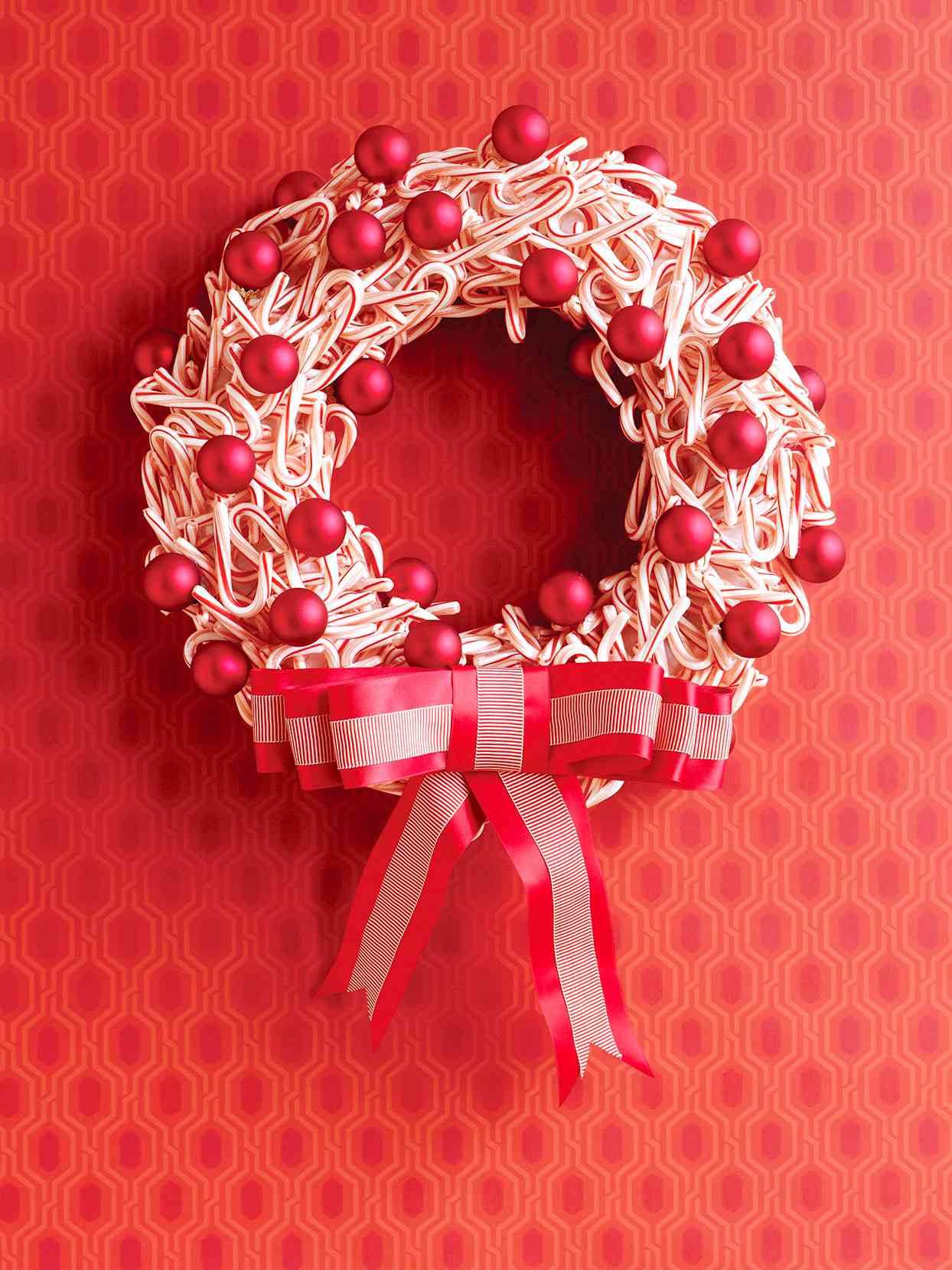 candy cane wreath with red ornaments