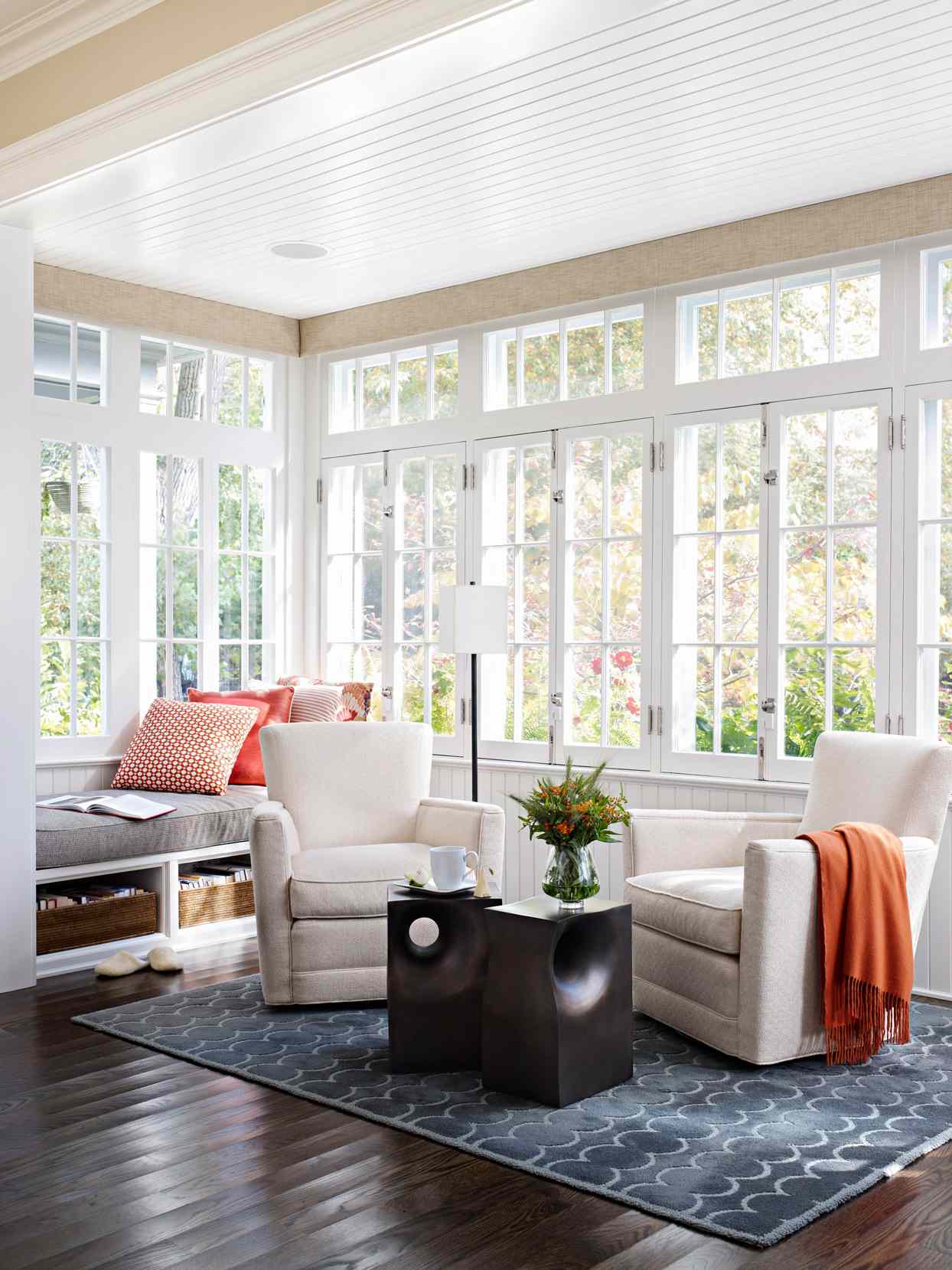 white chairs sunroom space