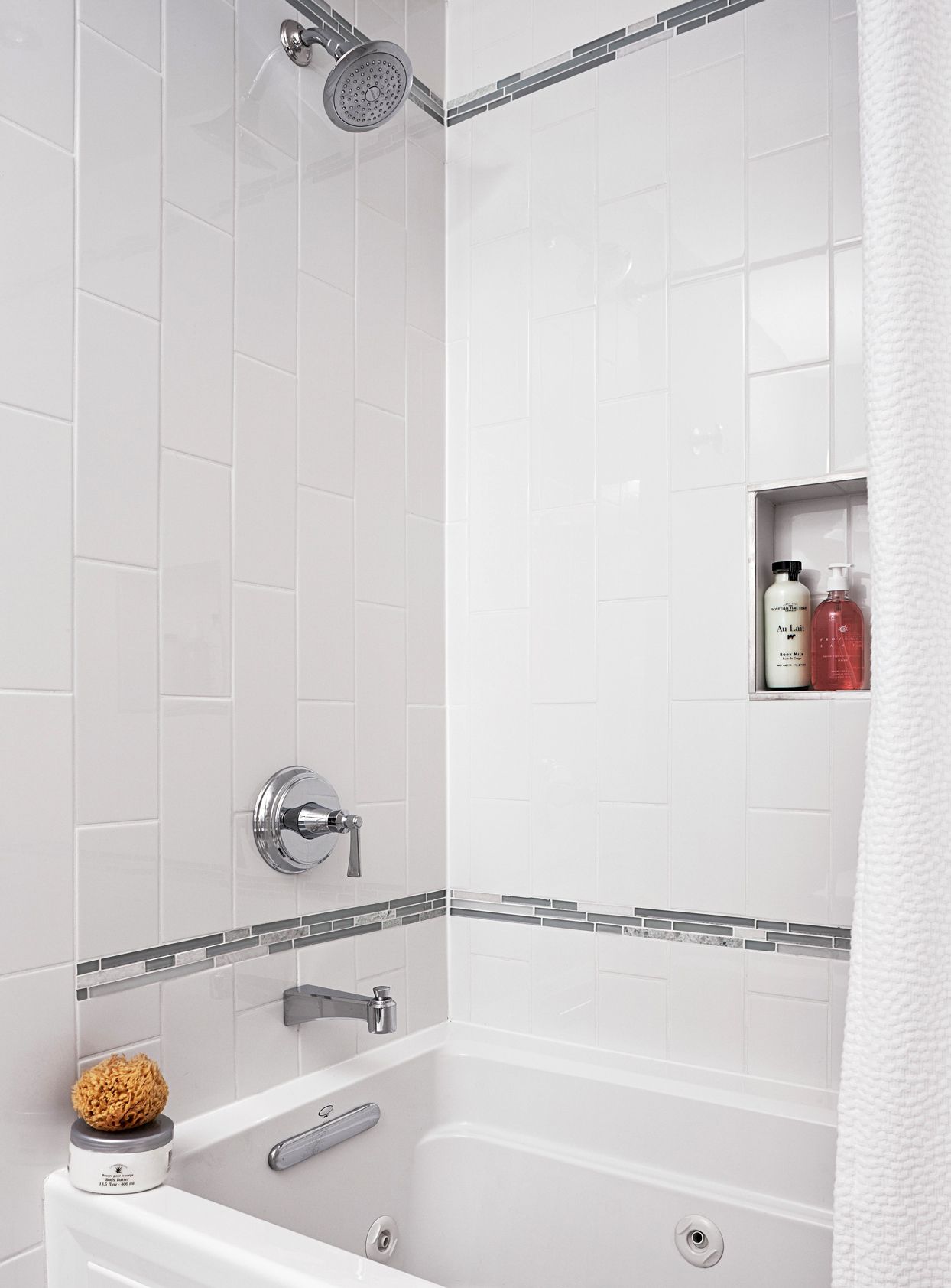 white tiling shower walls