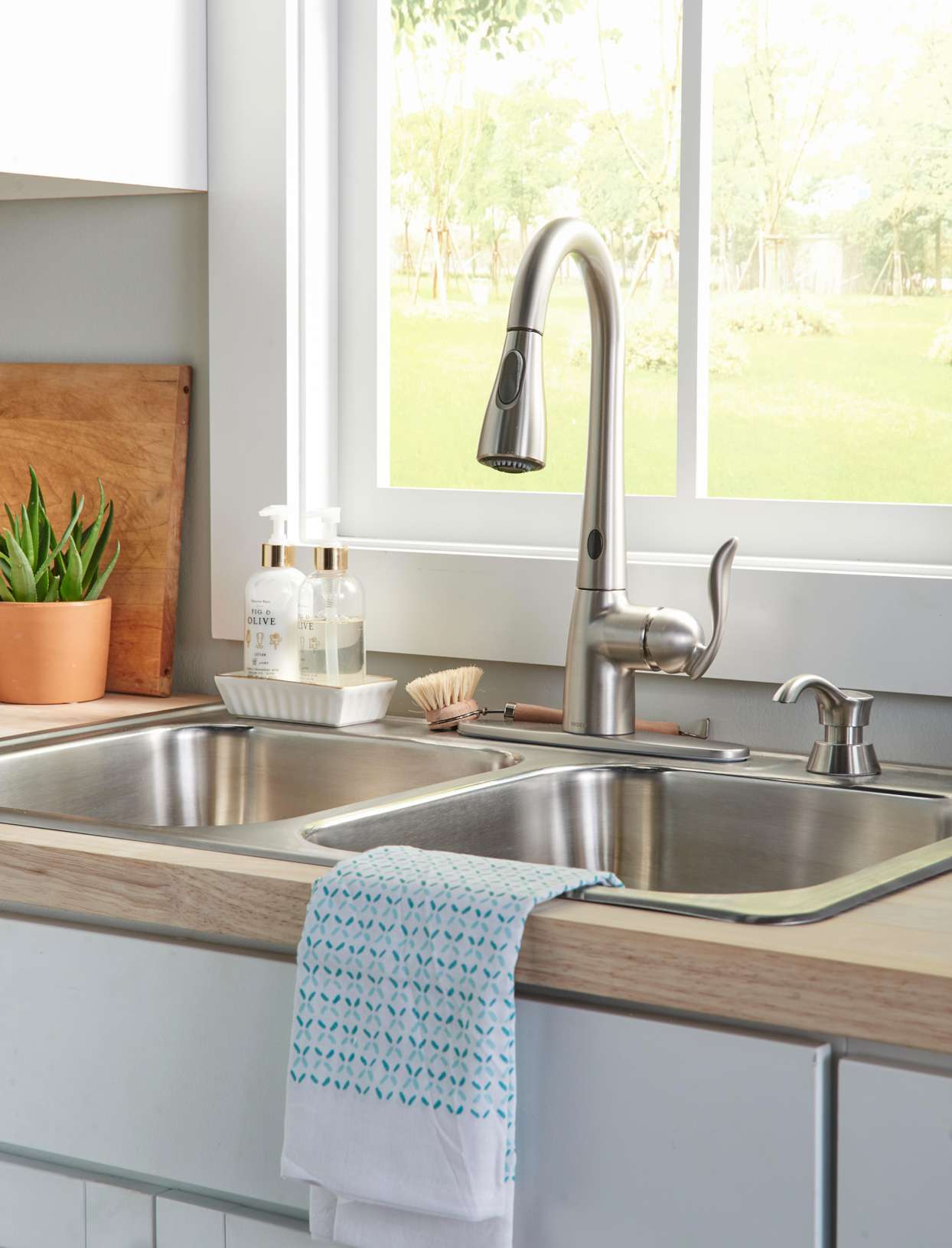 updated modern kitchen faucet sink with window