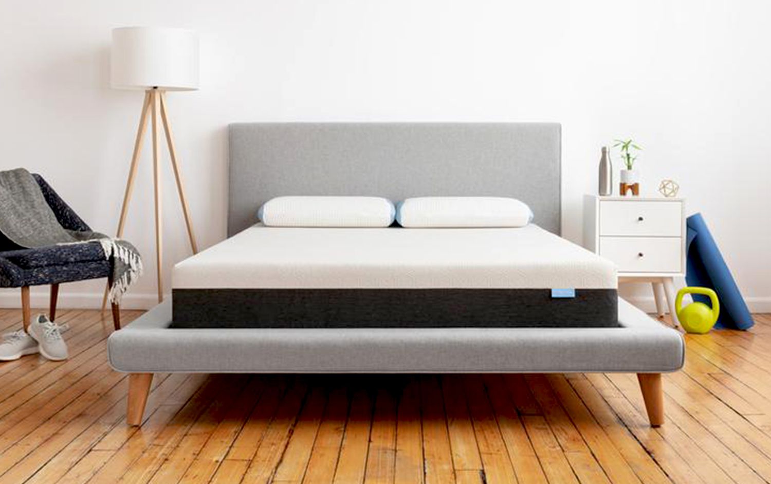 Mattress on a platform bed in a bedroom