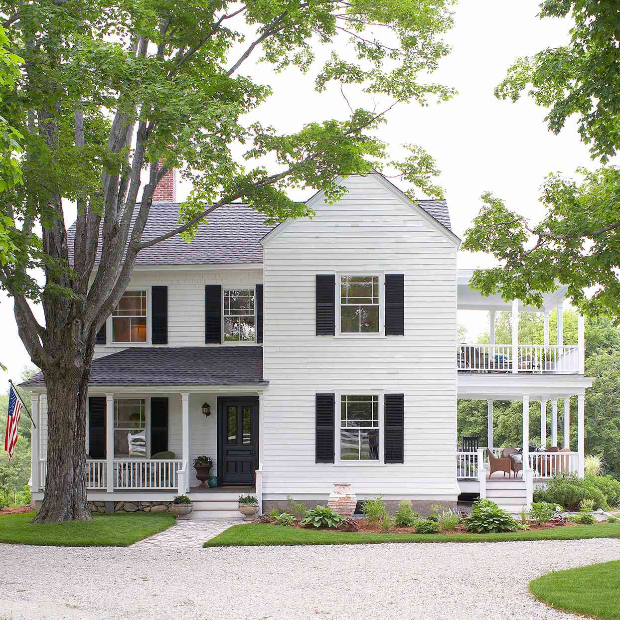white-and-black traditional farmhouse