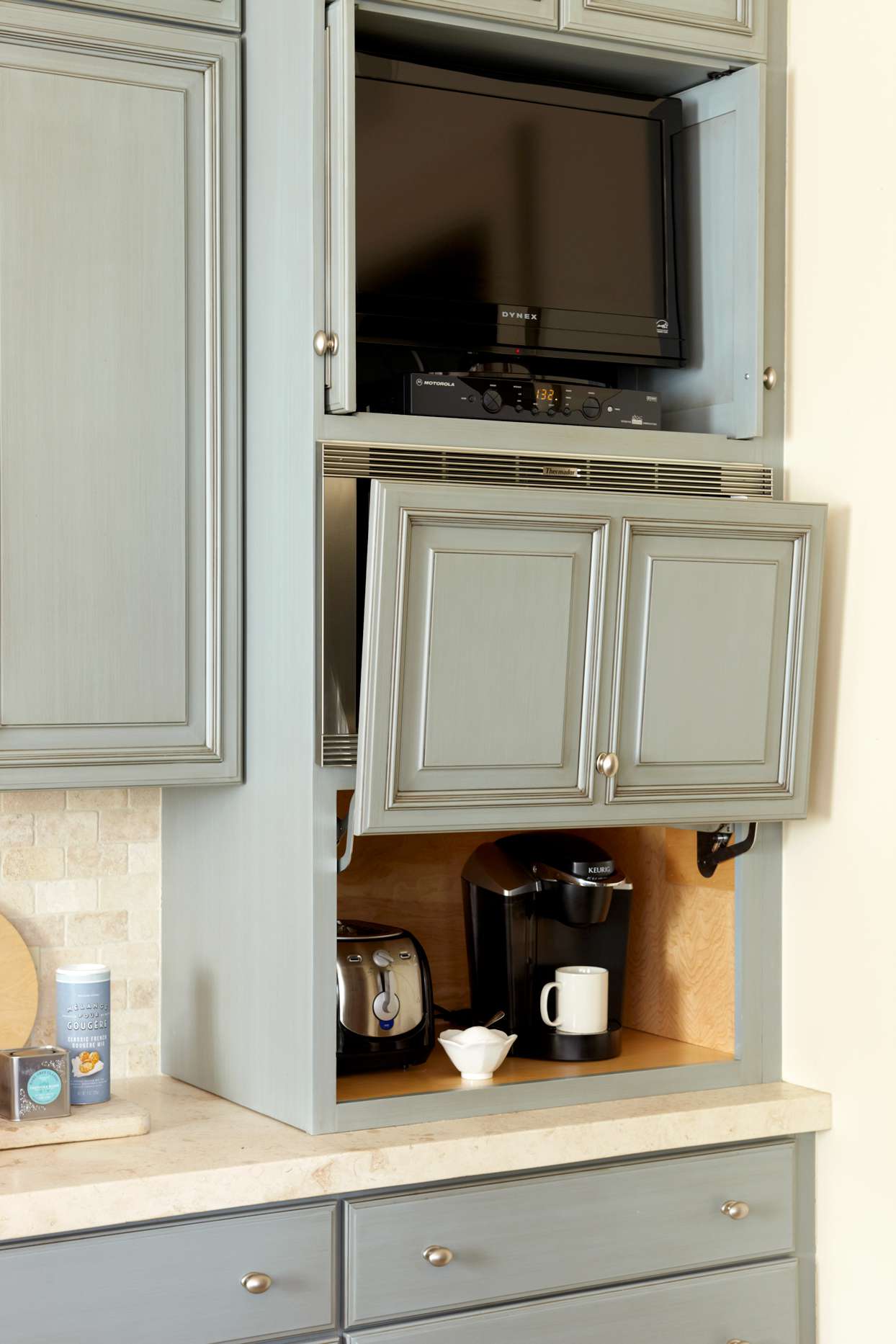 appliances in hideaway cabinet