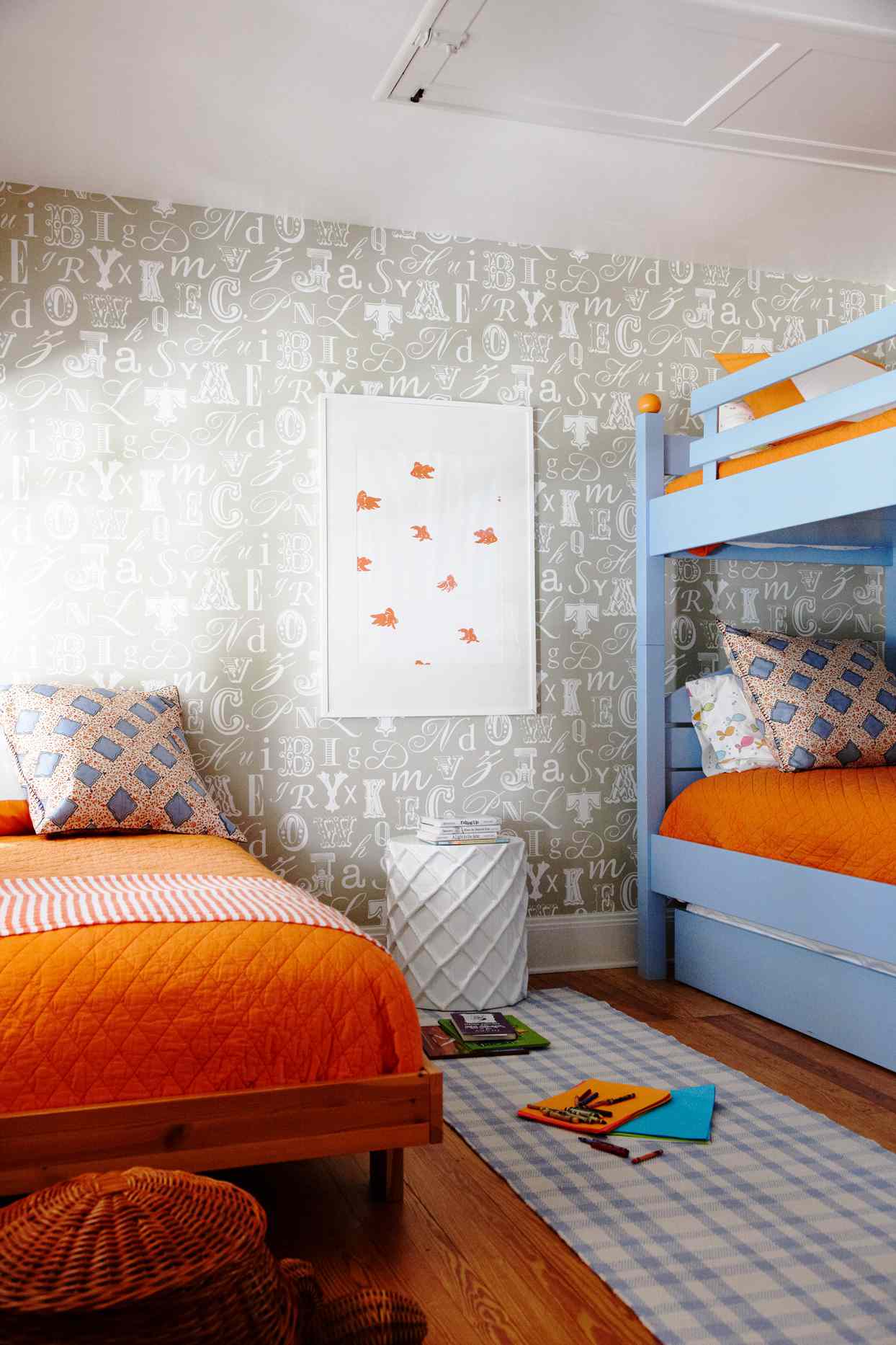 blue bunk beds with orange and grey accents