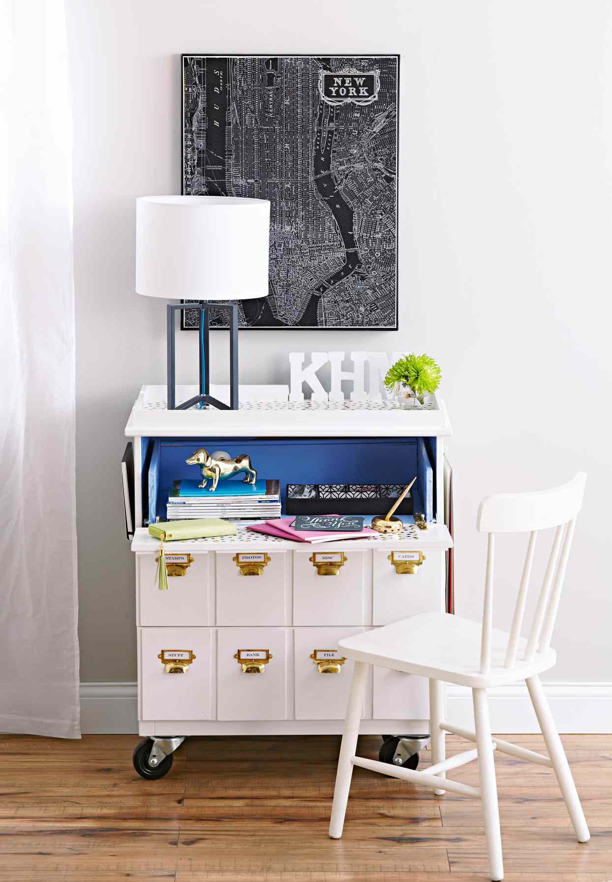 repurposed dresser white desk map poster above