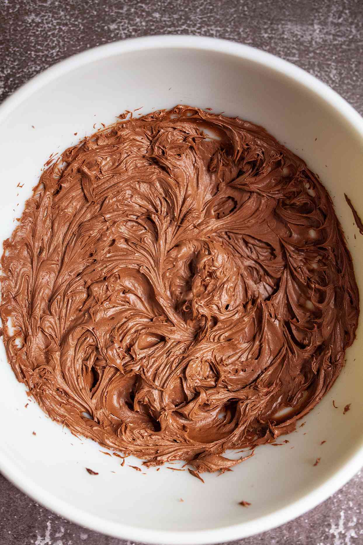 chocolate frosting whipped in bowl