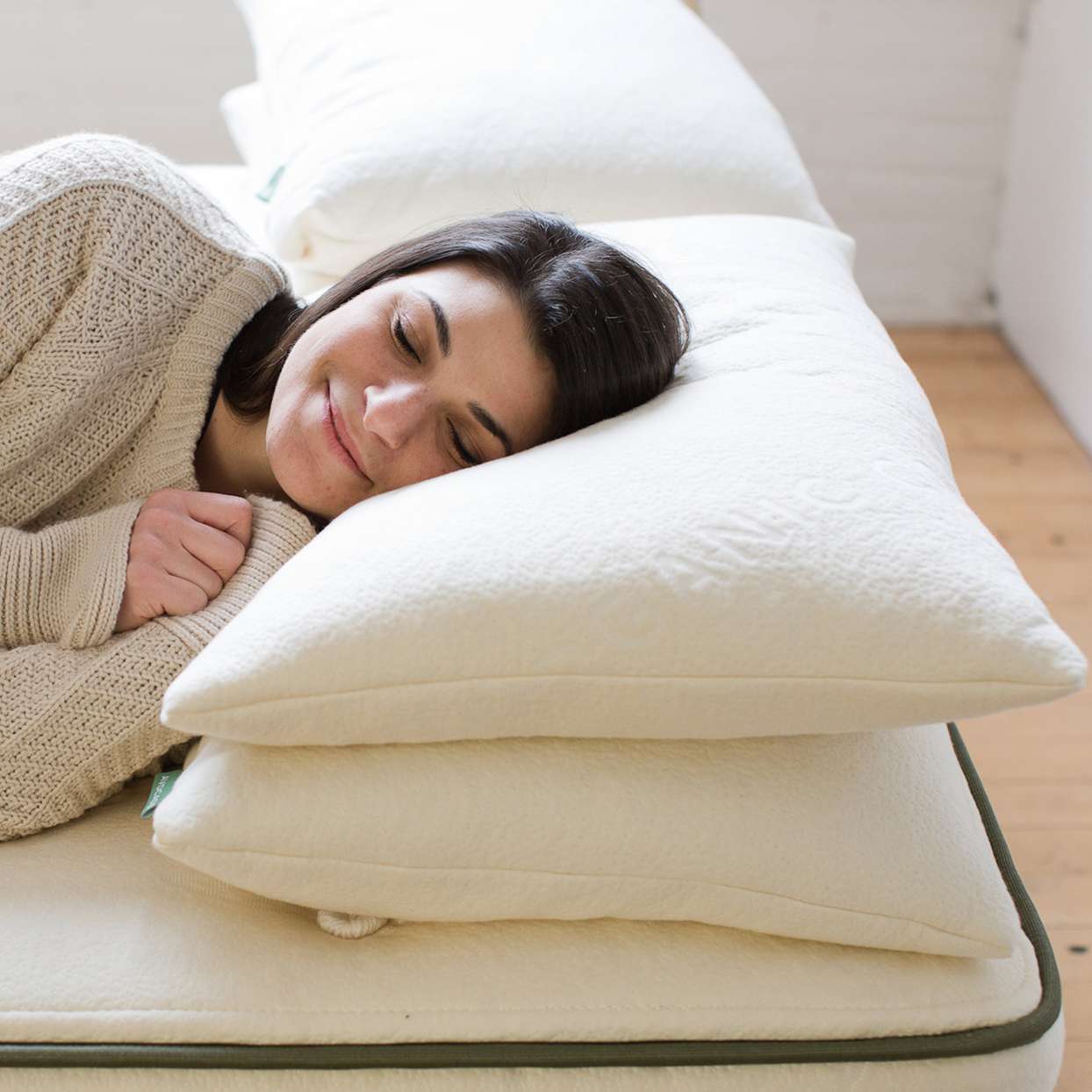 woman sleeping on latex pillows