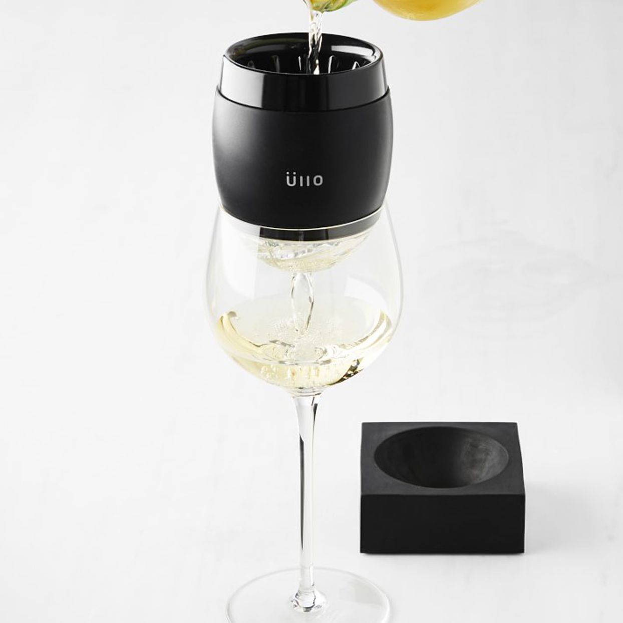 Chill wine purifier on a glass of white wine
