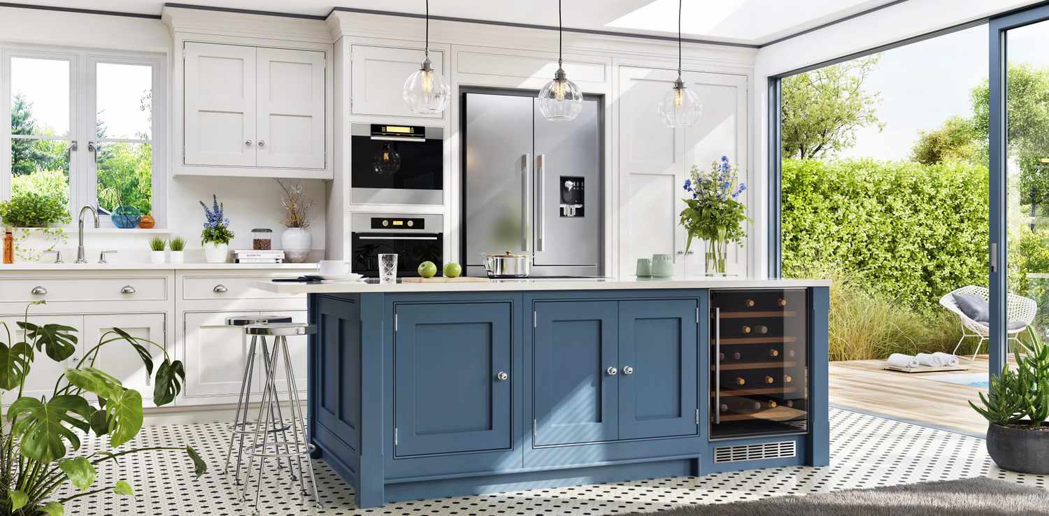 Interior of a home with a blue countertop with white granite and a stainless steel fridge with white cabinetry.
