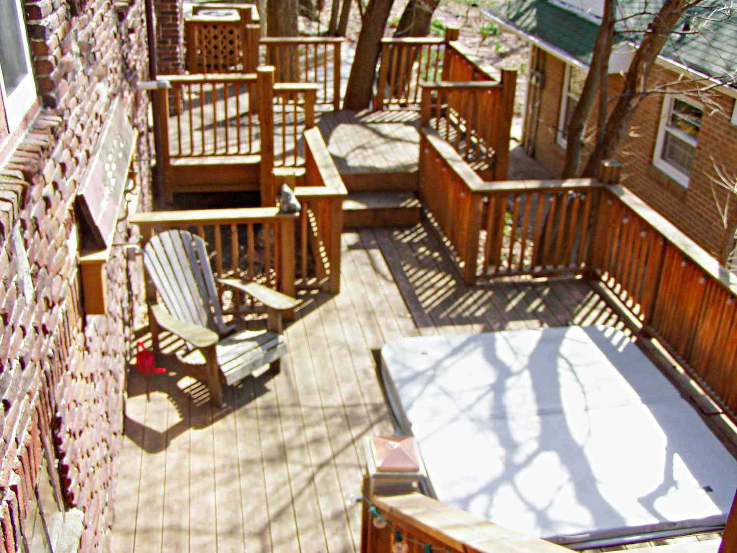 fenced deck covered hot tub