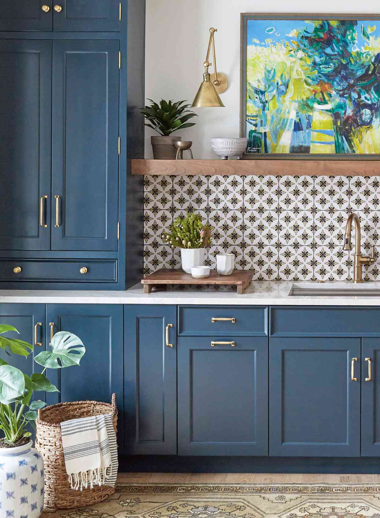 blue kitchen cabinets modern tile backsplash white counter