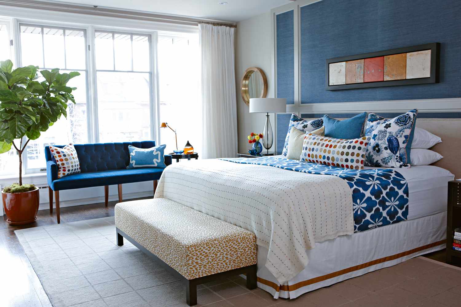 blue bedroom with grasscloth wallpaper