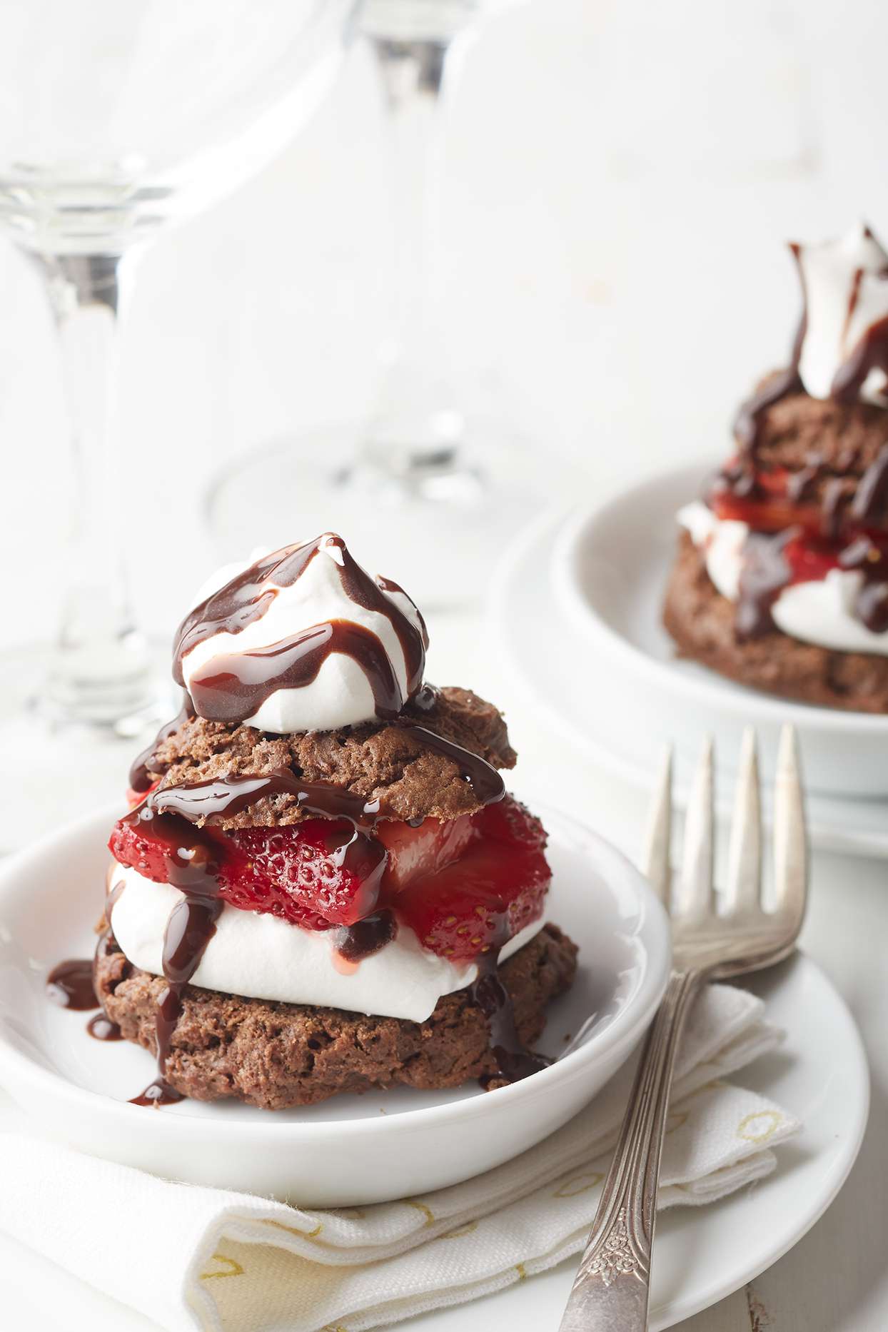 chocolate-strawberry shortcake on plate with fork