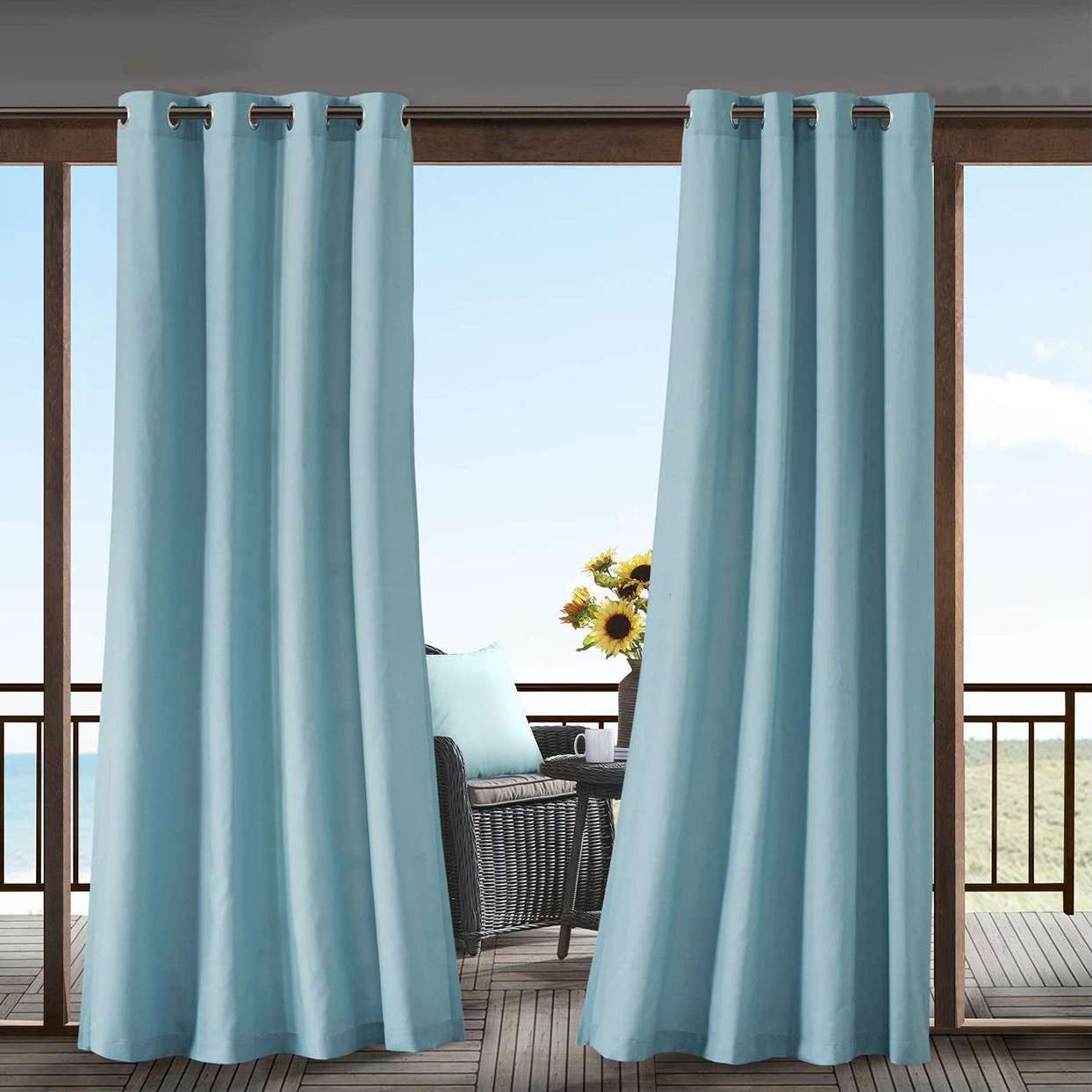 light blue outdoor curtains on deck